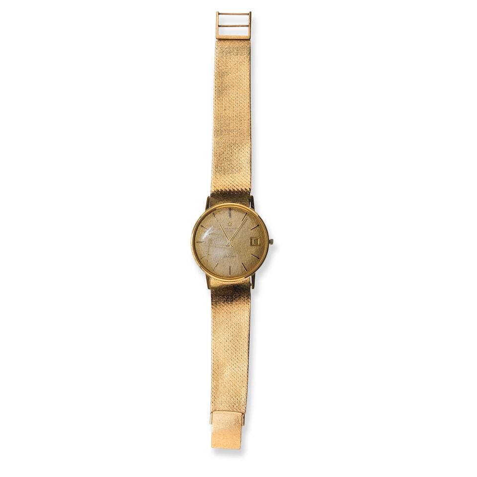 An Eterna-Matic 3000 'de Luxe' 18ct gold wristwatch, formerly the property of Paddy Hopkirk,: An Eterna-Matic 3000 'de Luxe' 18ct gold wristwatch, formerly the property of Paddy Hopkirk, gold case 34mm diameter, the caseback faintly marked '5071601', gold textured dial with hour bars and date 