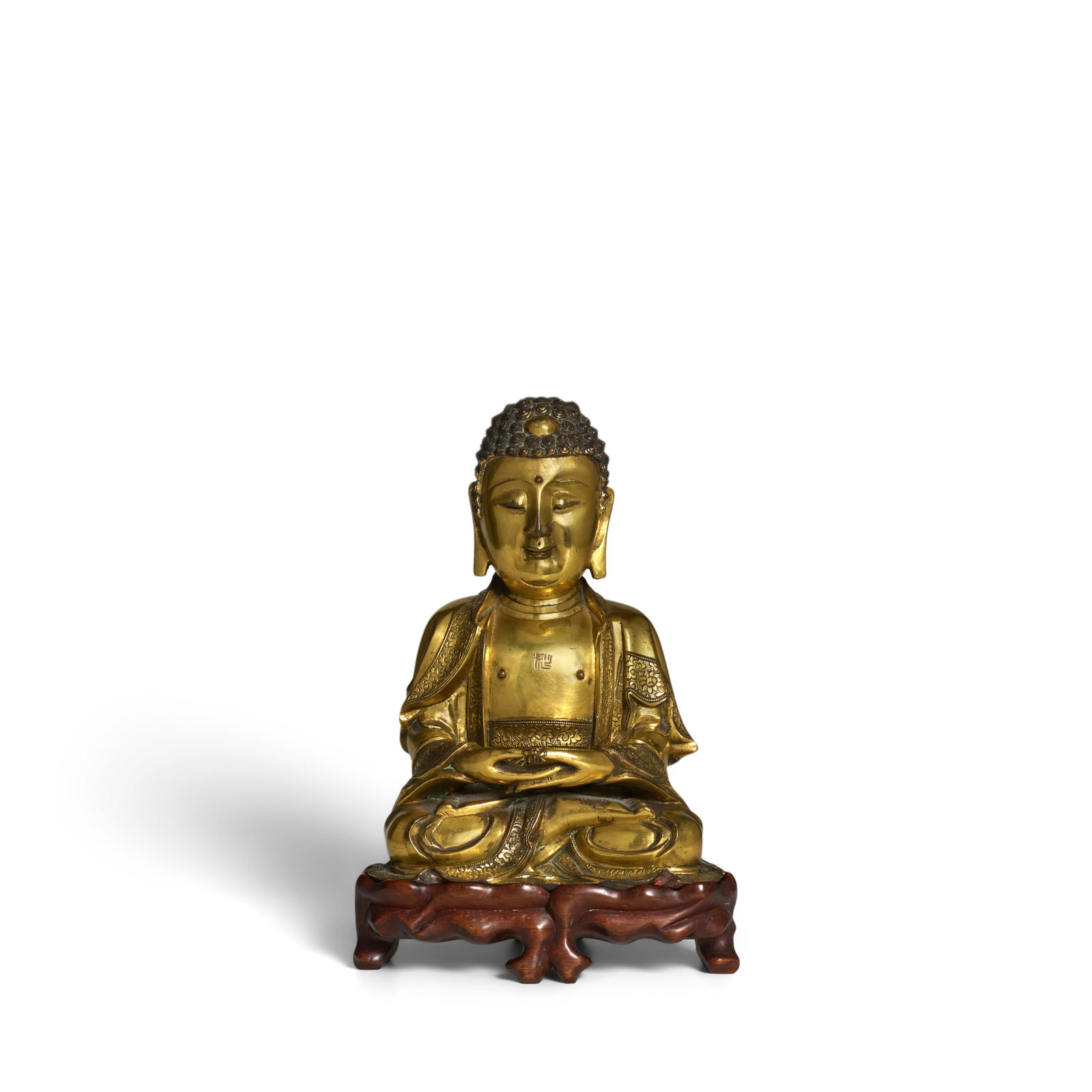 A GILT-BRONZE FIGURE OF AMITABHA BUDDHA Ming Dynasty, 16th/17th century (fitted wood stand) (1 of 1)