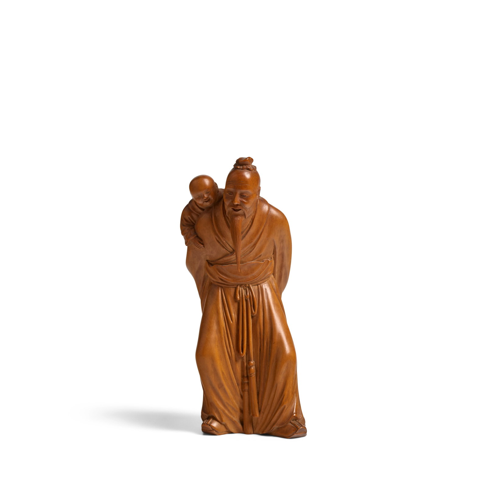 A BOXWOOD CARVING OF SHOULAO AND CHILD Early 20th century, marked Zichang (1 of 1)