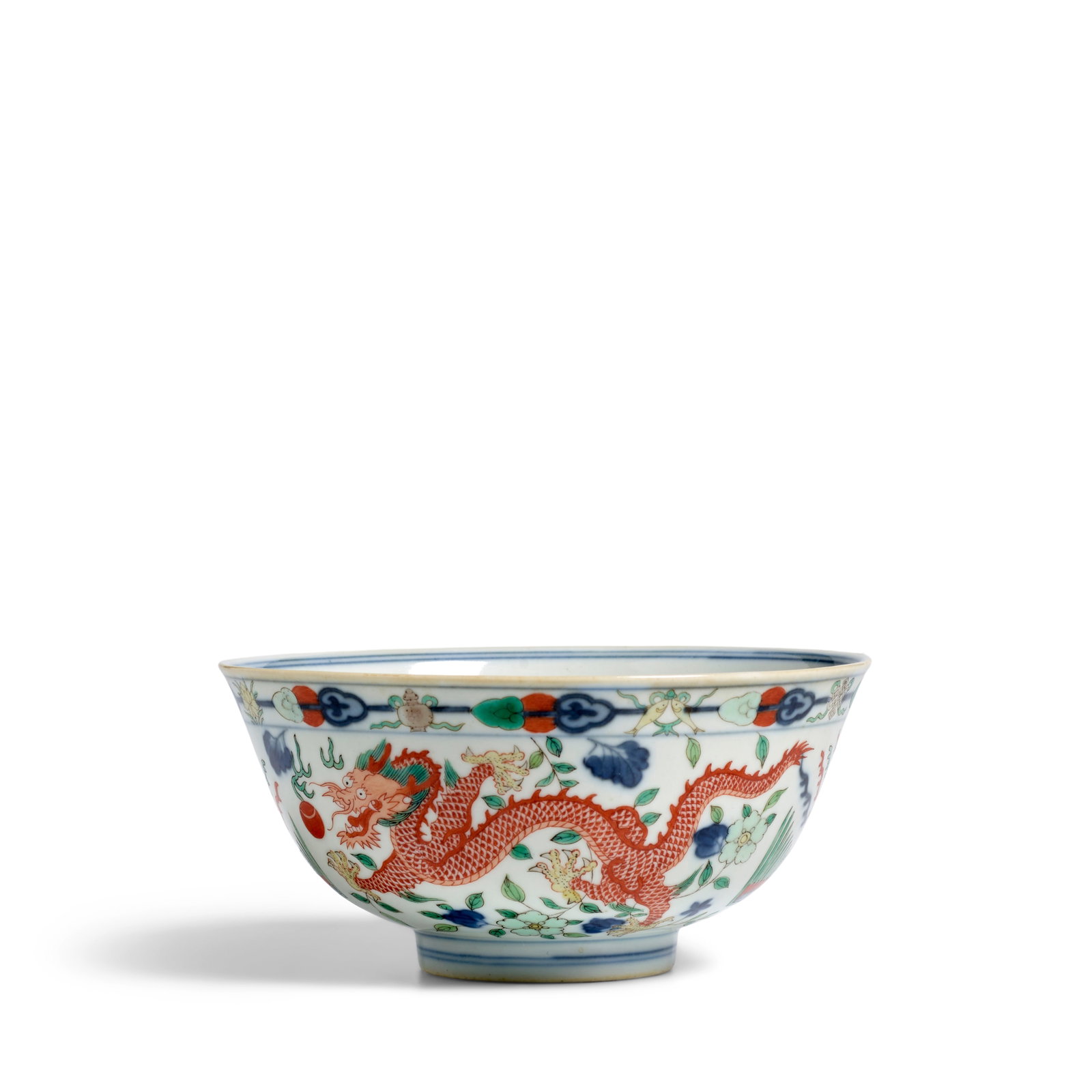 A WUCAI 'DRAGON AND PHOENIX' BOWL Daoguang six-character seal mark and of the period: A WUCAI 'DRAGON AND PHOENIX' BOWL Daoguang six-character seal mark and of the period Rising from a recessed circular foot and with a lipped rim, the body interspersed with five-clawed dragons chasing 