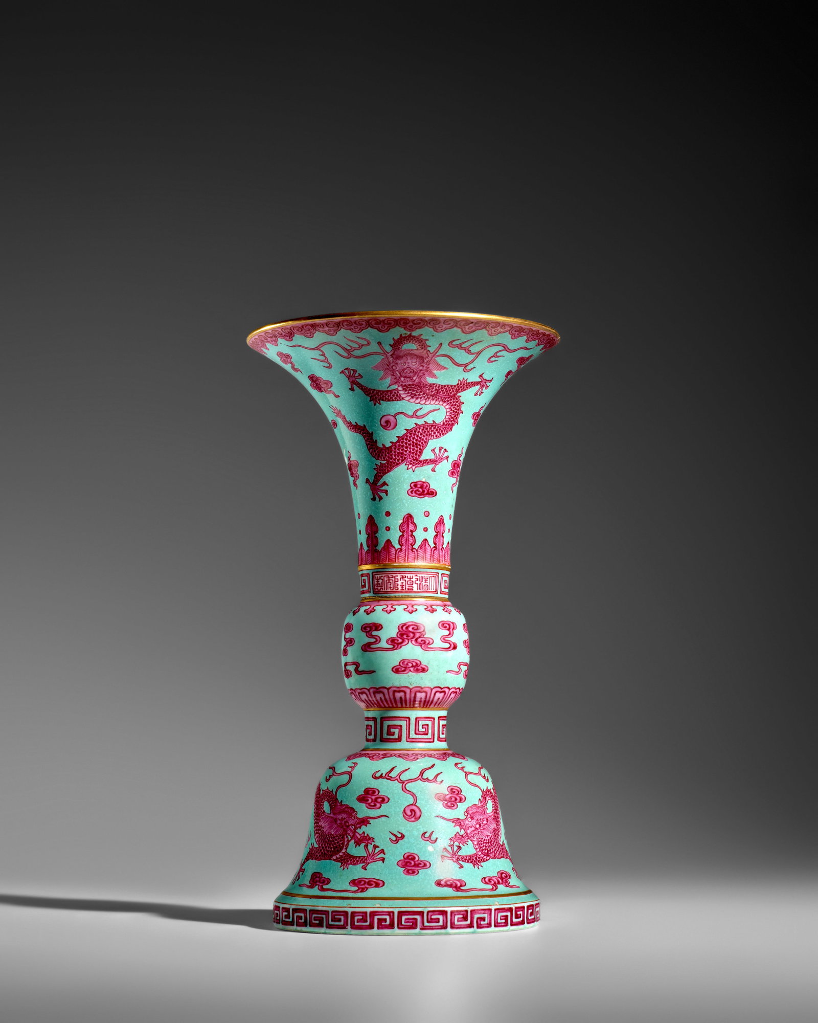 A RARE TURQUOISE-GROUND PUCE-ENAMELED 'DRAGON' ALTAR VASE, GU Qianlong six-character mark and of... (1 of 1)