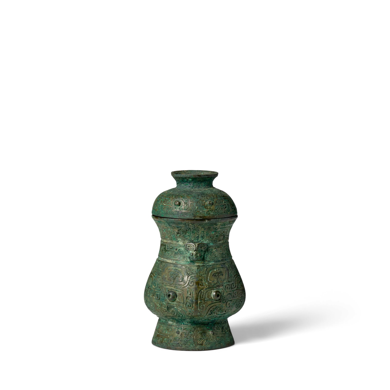 AN ARCHAIC BRONZE WINE VESSEL AND COVER, ZHI Late Shang/early Western Zhou Dynasty (brocade fitt... (1 of 1)