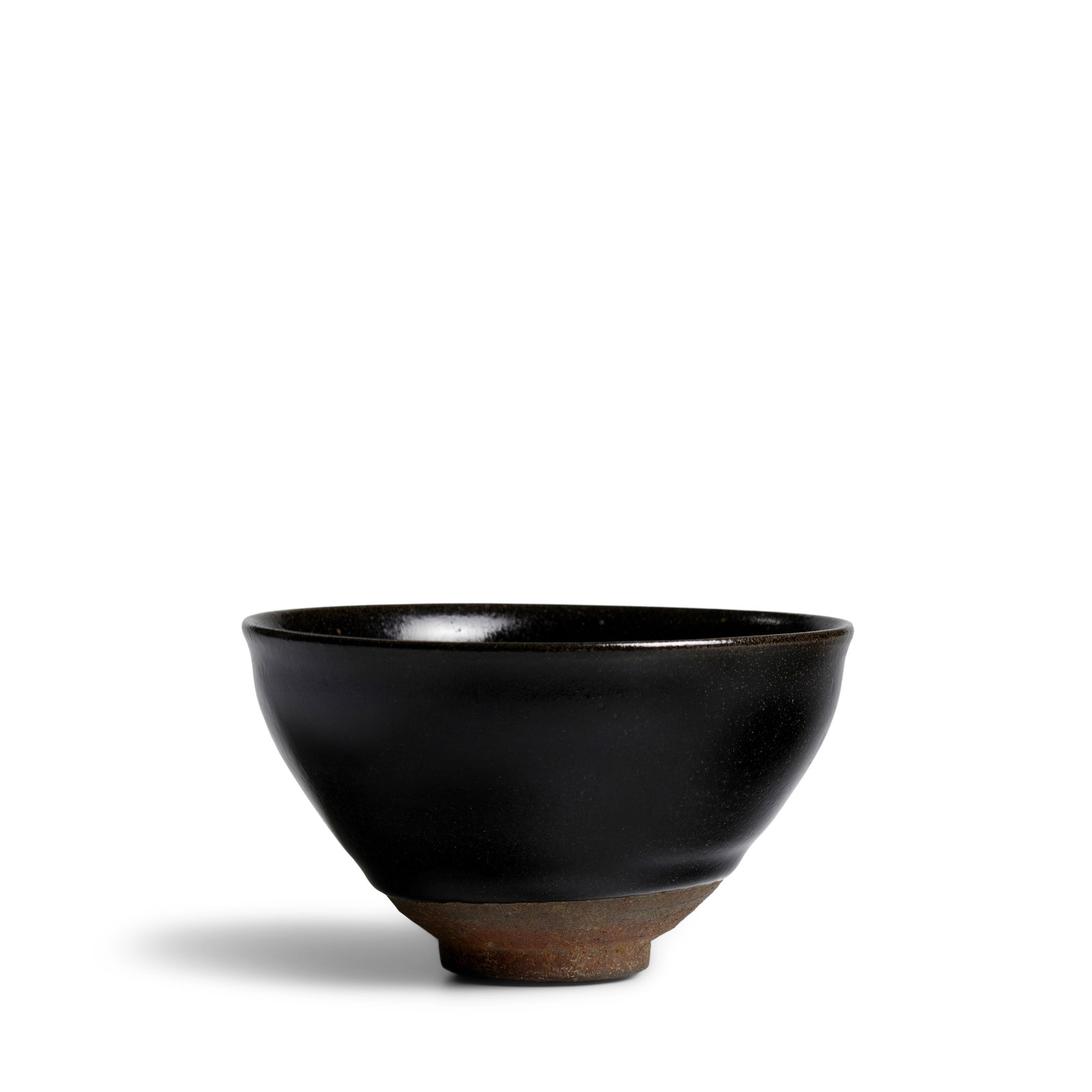 A BLACK-GLAZED JIAN TEA BOWL Southern Song Dynasty, with stamped Gongyu mark (Japanese wood box): A BLACK-GLAZED JIAN TEA BOWL Southern Song Dynasty, with stamped Gongyu mark The deep rounded sides rising to a slightly everted rim and with an indented 'finger groove' below the lip on the exterior,