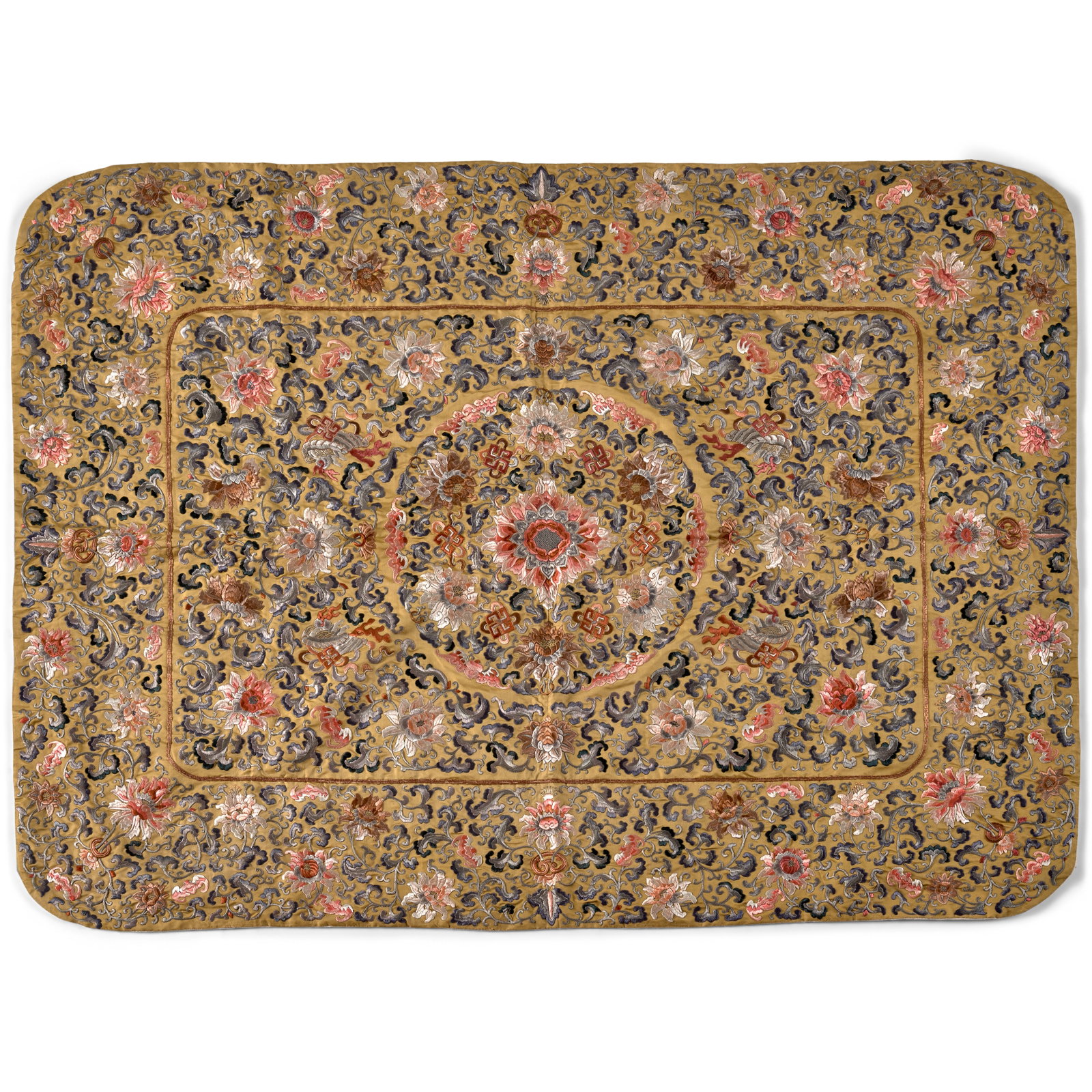 A YELLOW-GROUND SILK EMBROIDERED 'LOTUS AND PEONY' KANG CUSHION COVER 19th century: A YELLOW-GROUND SILK EMBROIDERED 'LOTUS AND PEONY' KANG CUSHION COVER 19th century Finely worked in colored silks and couched gilt thread, the field centered with a lotus medallion surrounded by flyin