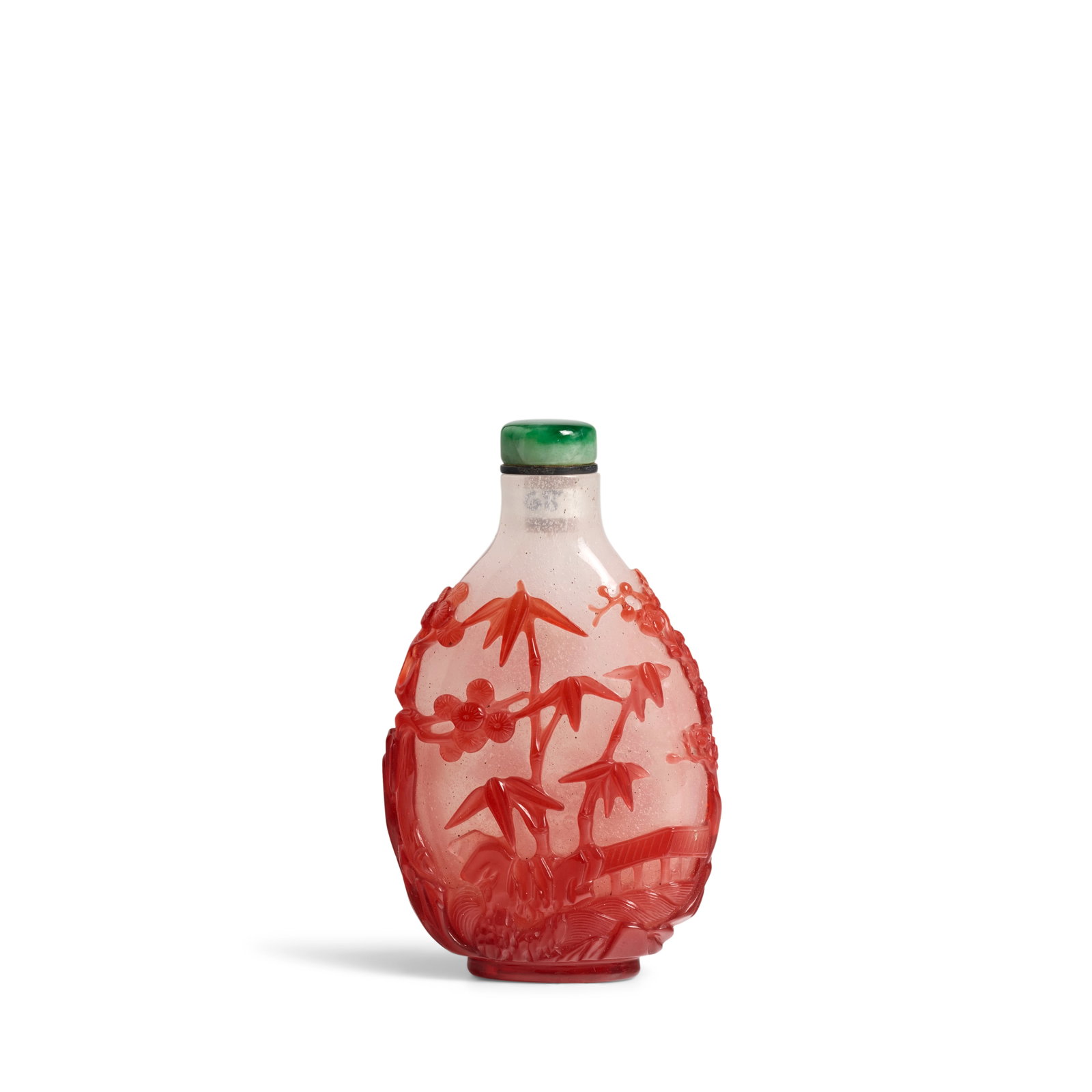 A FINE RUBY RED GLASS 'THREE FRIENDS' OVERLAY SNUFF BOTTLE 1750-1820: A FINE RUBY RED GLASS 'THREE FRIENDS' OVERLAY SNUFF BOTTLE 1750-1820 Of flattened ovoid shape tapering to a long cylindrical neck, straight rim and wide mouth, the 'snowflake' bottle finely overlaid w