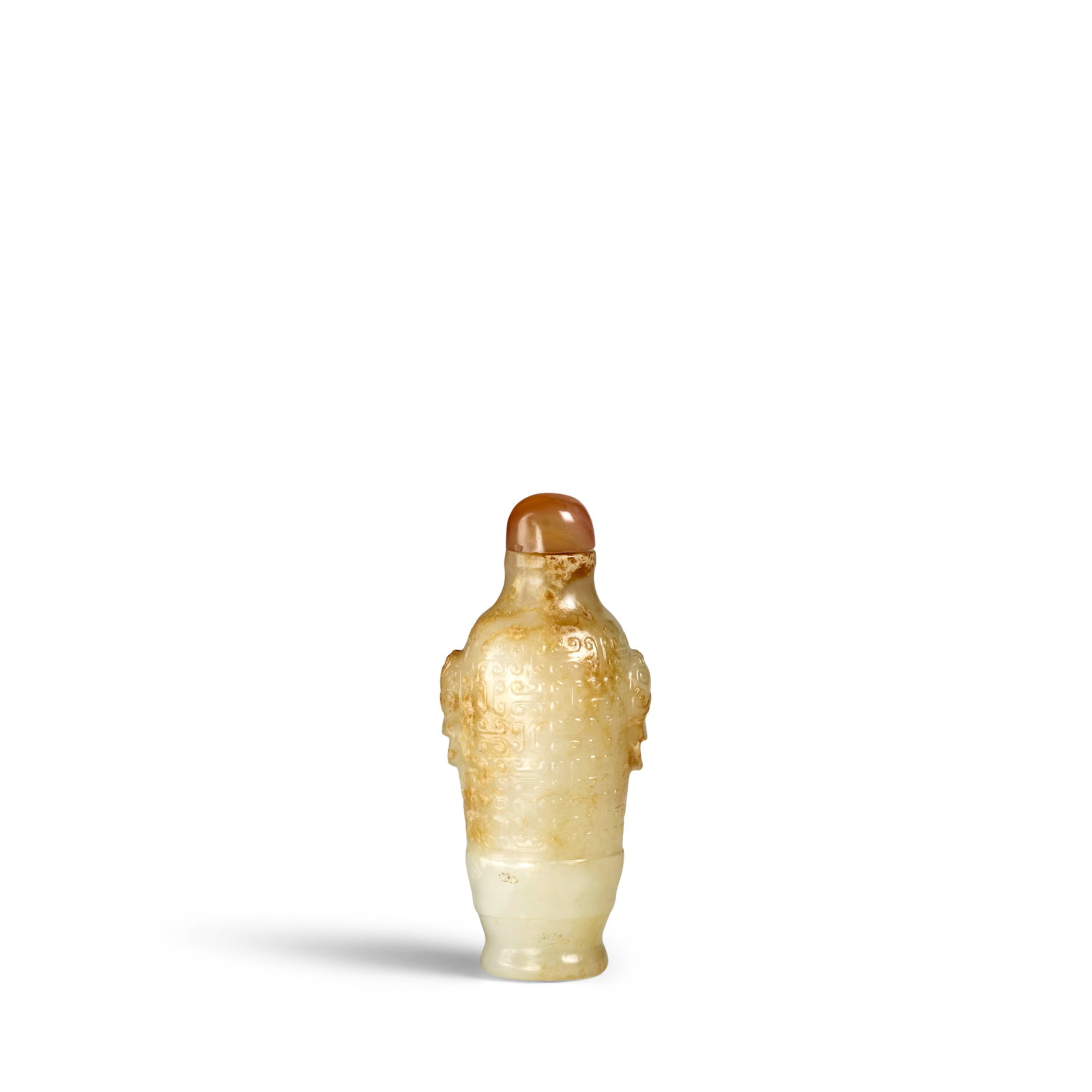 A RARE RUSSET-TINGED CARVED WHITE JADE BANDED SNUFF BOTTLE 1750-1820: A RARE RUSSET-TINGED CARVED WHITE JADE BANDED SNUFF BOTTLE 1750-1820 Of tapered high-shouldered cylindrical form with short neck and straight, wide mouth, the slender body carved with a wide banded ne