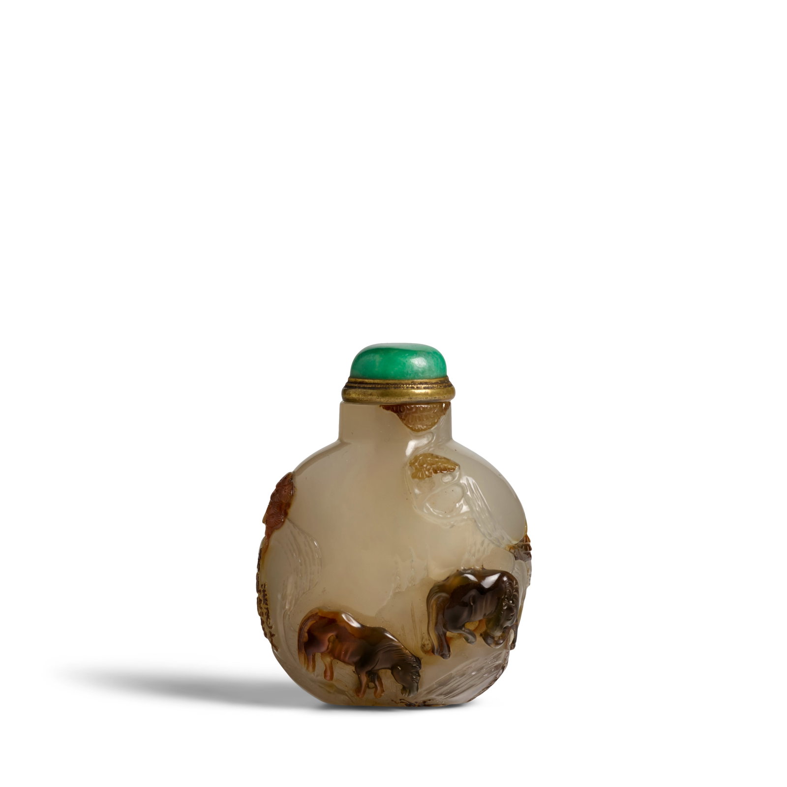 A FINE AND RARE AGATE 'TWO HORSES' SNUFF BOTTLE Suzhou, 1740-1850: A FINE AND RARE AGATE 'TWO HORSES' SNUFF BOTTLE Suzhou, 1740-1850 Splendidly carved in circular form raised on a flat foot, tapering to an oval neck and straight mouth, finely executed with two horses