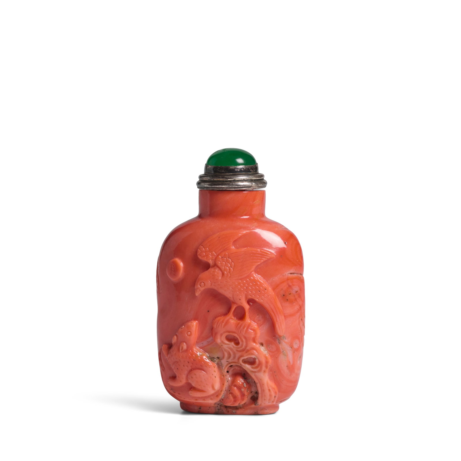 A CORAL CARVED SNUFF BOTTLE 19th century: A CORAL CARVED SNUFF BOTTLE 19th century Of high-shouldered baluster shape with flat rim and small mouth opening, carved with a continuous landscape scene showing an eagle perched on a rock above a yo