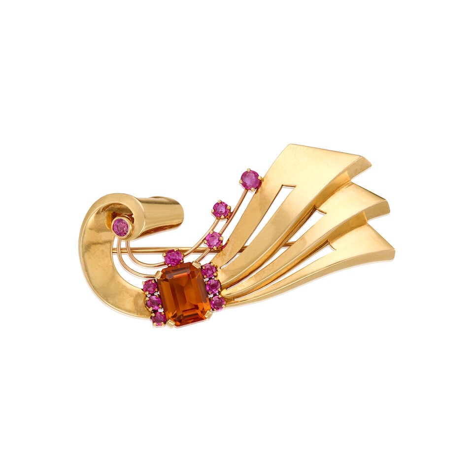TIFFANY & CO.: A 14K GOLD, CITRINE AND PINK SAPPHIRE RETRO BROOCH: TIFFANY & CO.: CITRINE AND PINK SAPPHIRE RETRO BROOCH • One emerald-shaped citrine weighing approximately 2.79 carats • Eleven round-shaped pink sapphire weighing approximately 1.40
