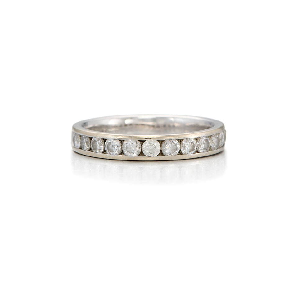 14K WHITE GOLD AND DIAMOND RING: 14K WHITE GOLD AND DIAMOND RING • Twelve round brilliant-cut diamonds weighing approximately 1.04 carats total • Size 9 3/4 • Estimated gross weight: 4.60 grams Footnotes: OVERALL