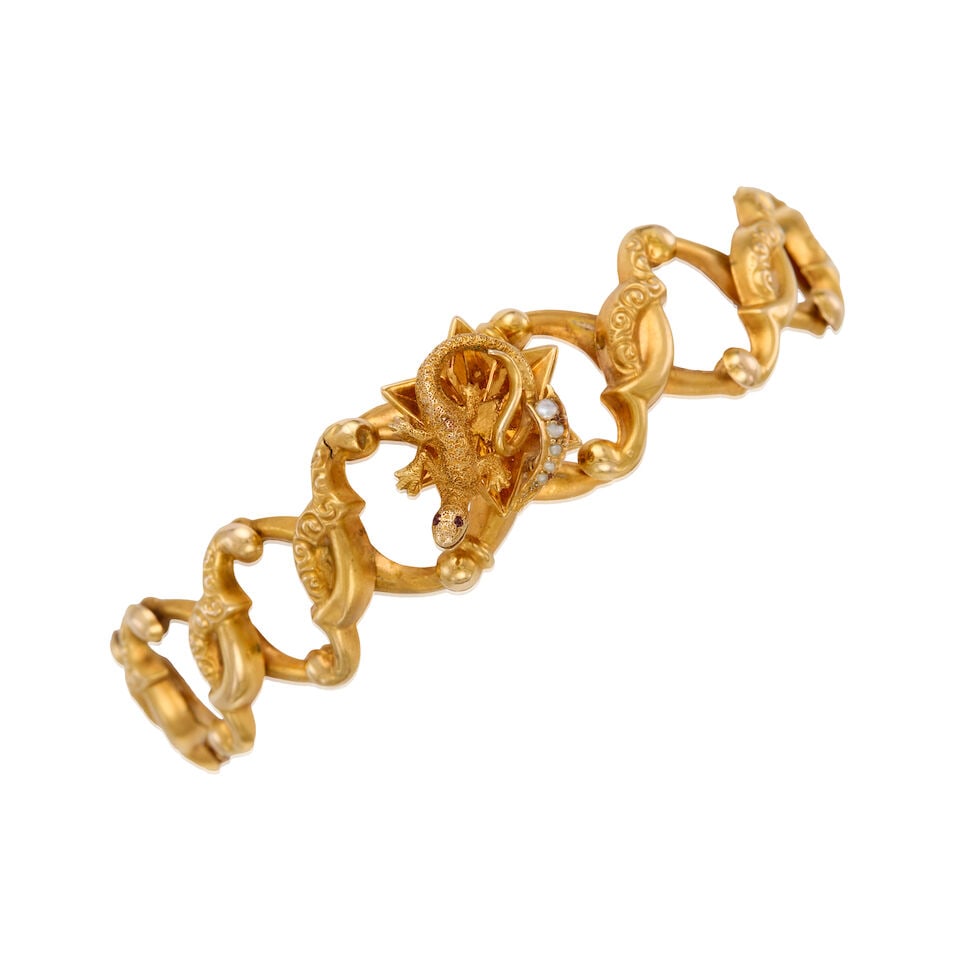 14K GOLD AND MOTHER OF PEARL EXPENDABLE BRACELET: 14K GOLD AND MOTHER OF PEARL EXPENDABLE BRACELET • Five mother of pearls measuring approximately 1mm to 2mm in diameter • Inner circumference 3 in. to 6 3/4 in. • Estimated gross