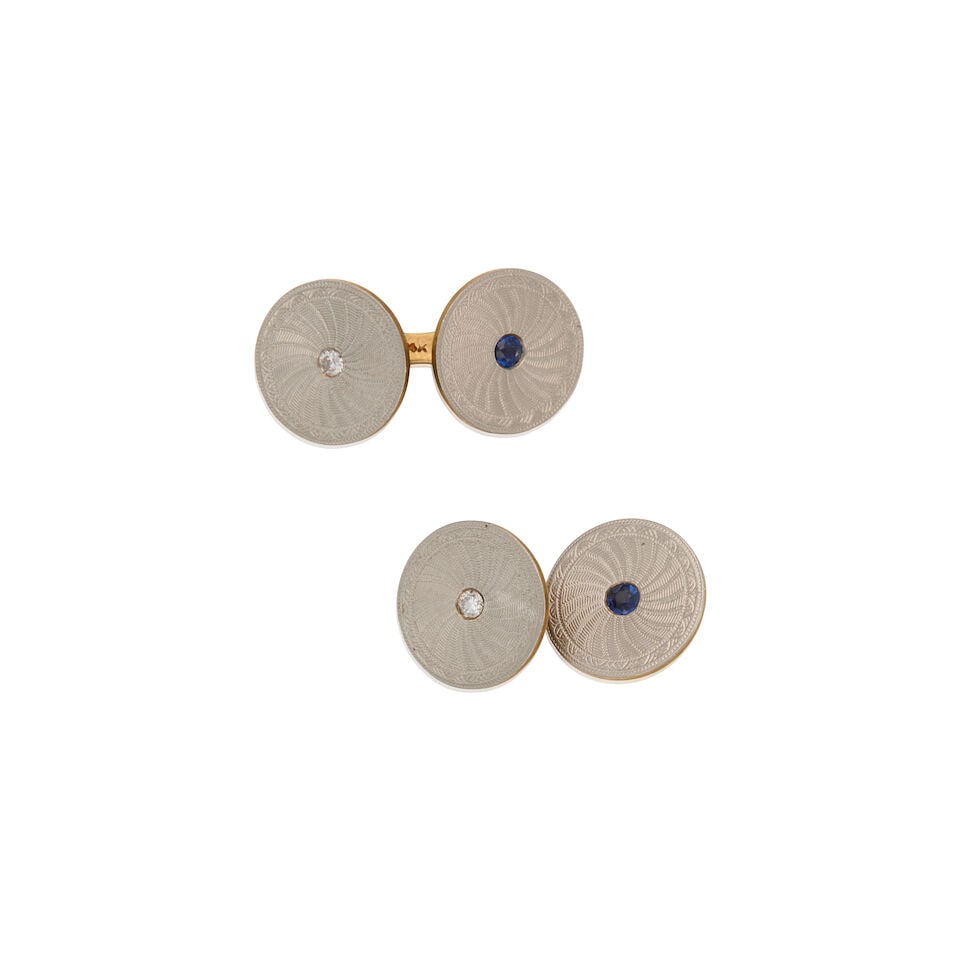 DIAMOND AND SAPPHIRE DISC CUFFLINKS: DIAMOND AND SAPPHIRE DISC CUFFLINKS • Platinum and 14K yellow gold • Two round-shaped sapphires weighing approximately 0.15 carat total • Two round brilliant-cut diamonds weighing