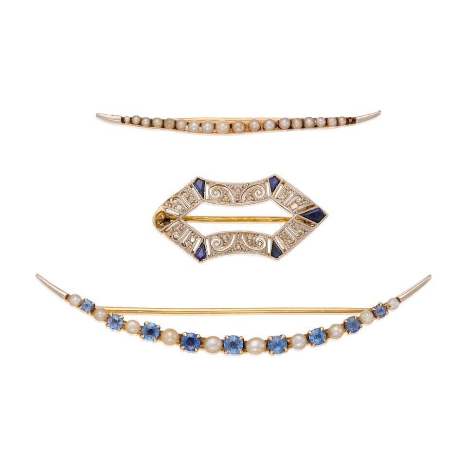 A GROUP OF ANTIQUE, SAPPHIRE, CULTURED PEARL AND DIAMOND BROOCHES: A GROUP OF ANTIQUE, SAPPHIRE, CULTURED PEARL AND DIAMOND BROOCHES • A 14K yellow and white gold brooch with eighteen round shaped cultured pearls measuring approximately 1.65mm to 2.57mm in