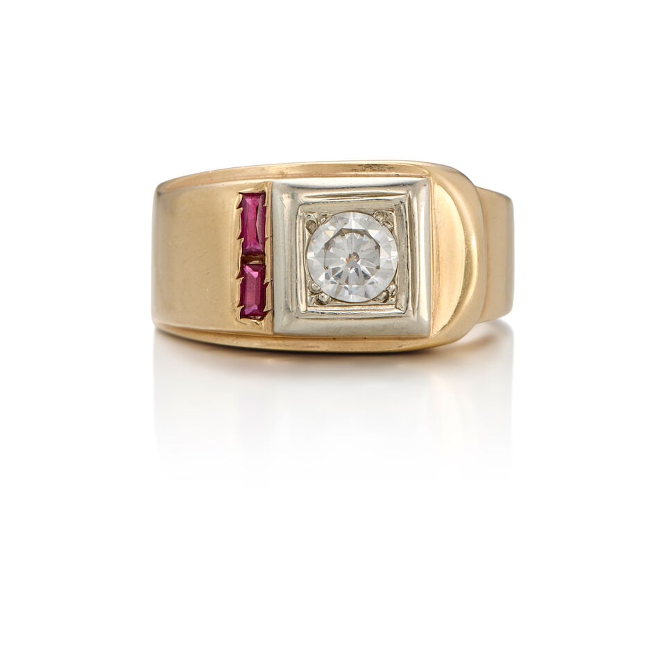 13K BICOLORED GOLD, DIAMOND AND SYNTHETIC RUBY RING: 13K BICOLORED GOLD, DIAMOND AND SYNTHETIC RUBY RING • 13K yellow and white gold • One round brilliant-cut diamond weighing approximately 0.60 carat • Two rectangular-shaped
