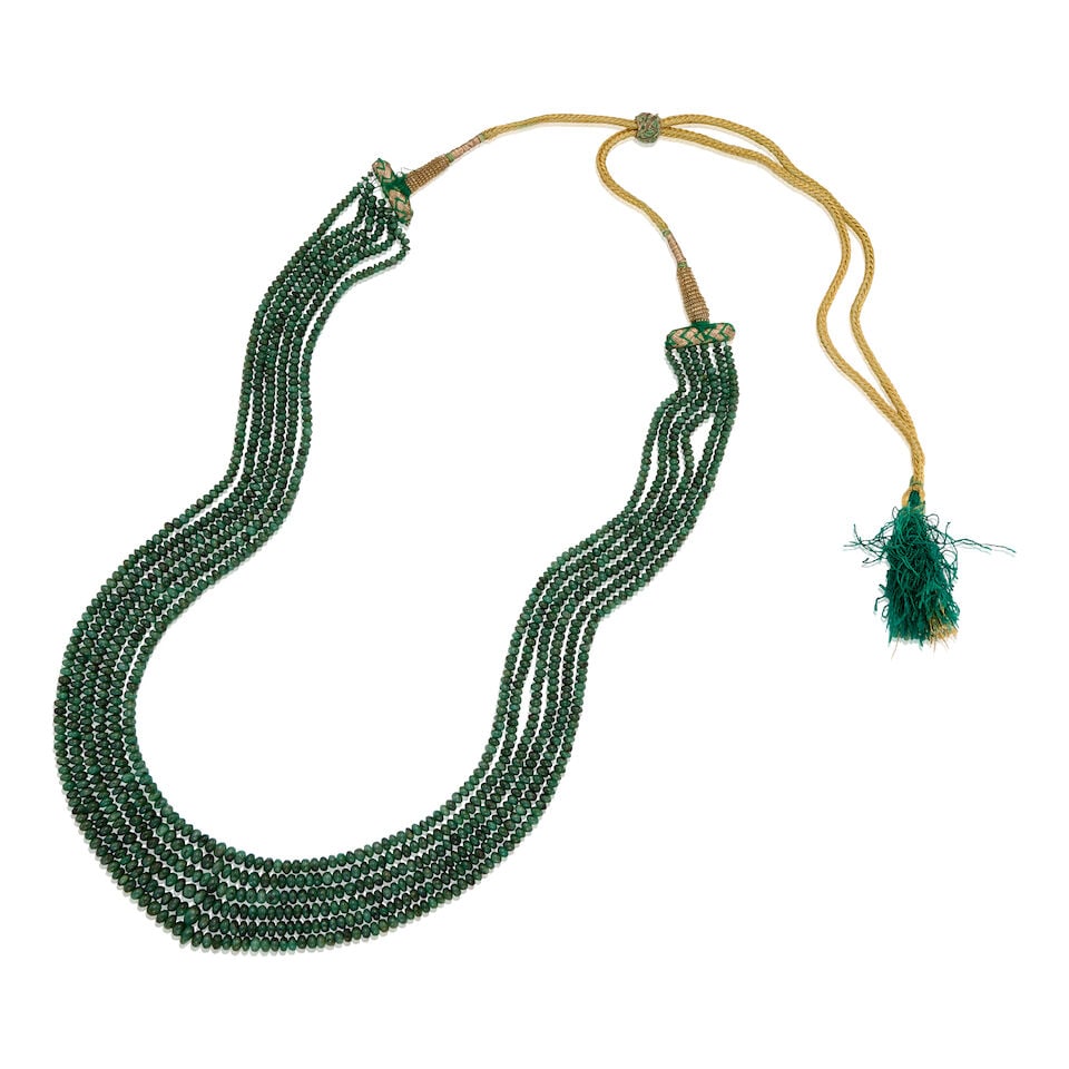MULTISTRAND EMERALD BEAD NECKLACE: MULTISTRAND EMERALD BEAD NECKLACE • Six strands of round-shaped and drilled emerald beads measuring approximately 3.47mm to 4.50mm in diameter • Emerald necklace length 22 in. and fabric l