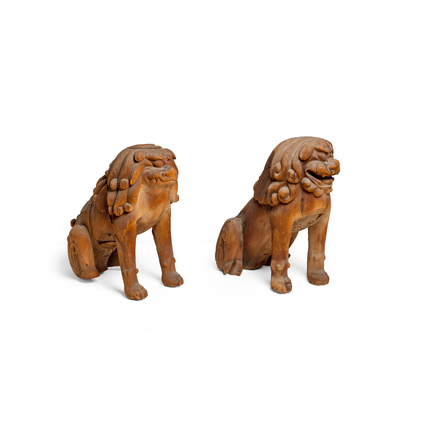 A LARGE PAIR OF SHISHI AND KOMA-INU (LION DOGS) Kamakura period (1185-1333), early 14th century: A LARGE PAIR OF SHISHI AND KOMA-INU (LION DOGS) Kamakura period (1185-1333), early 14th century Each carved and assembled from wood, with curly manes and tails and well-defined musculature, the shishi