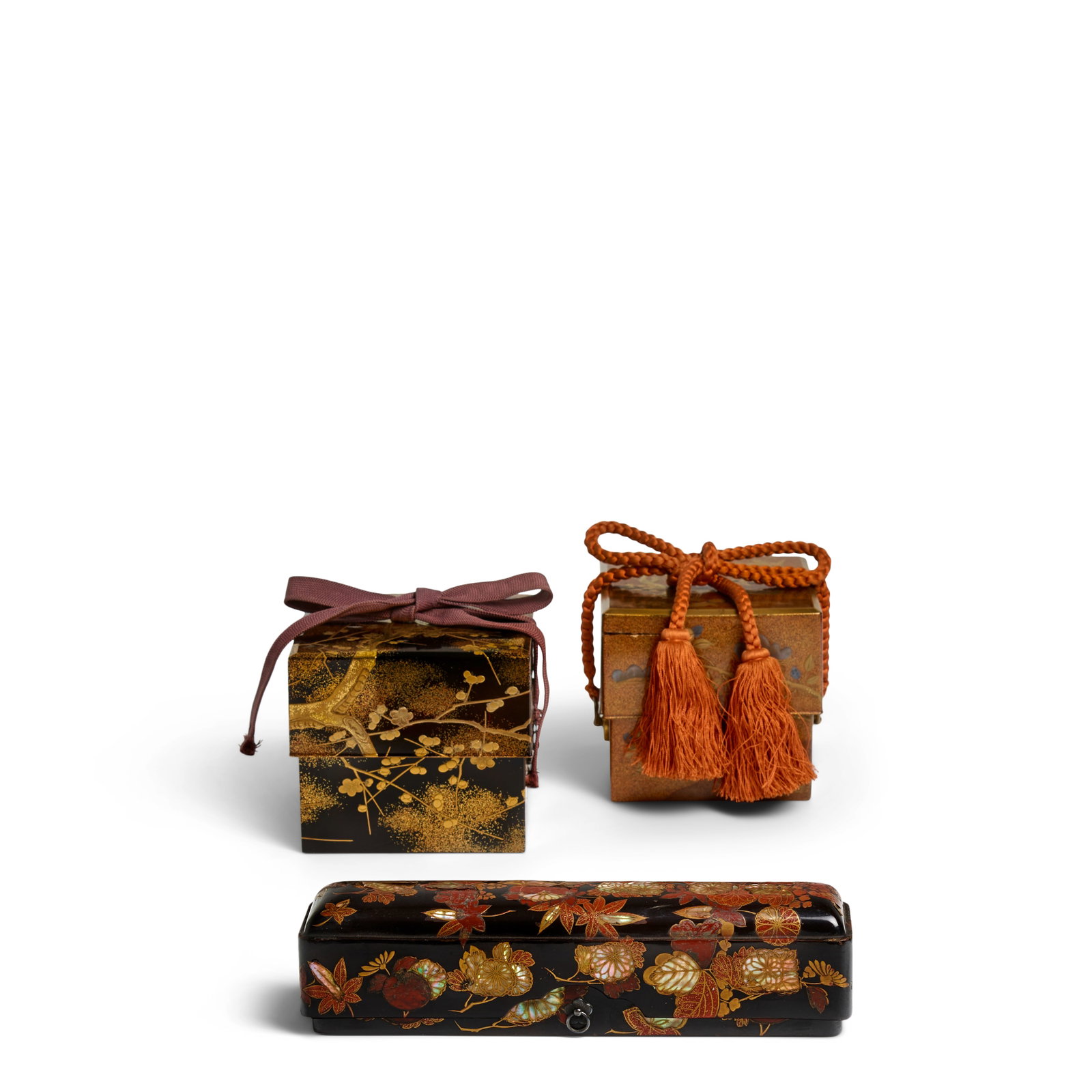 THREE LACQUER BOXES Edo period (1615-1868), 17th, 18th, and 19th century (3): THREE LACQUER BOXES Edo period (1615-1868), 17th, 18th, and 19th century All with kabusebuta (overhanging lids), the first a fubako (box for letters), of standard rounded rectangular form, the black g