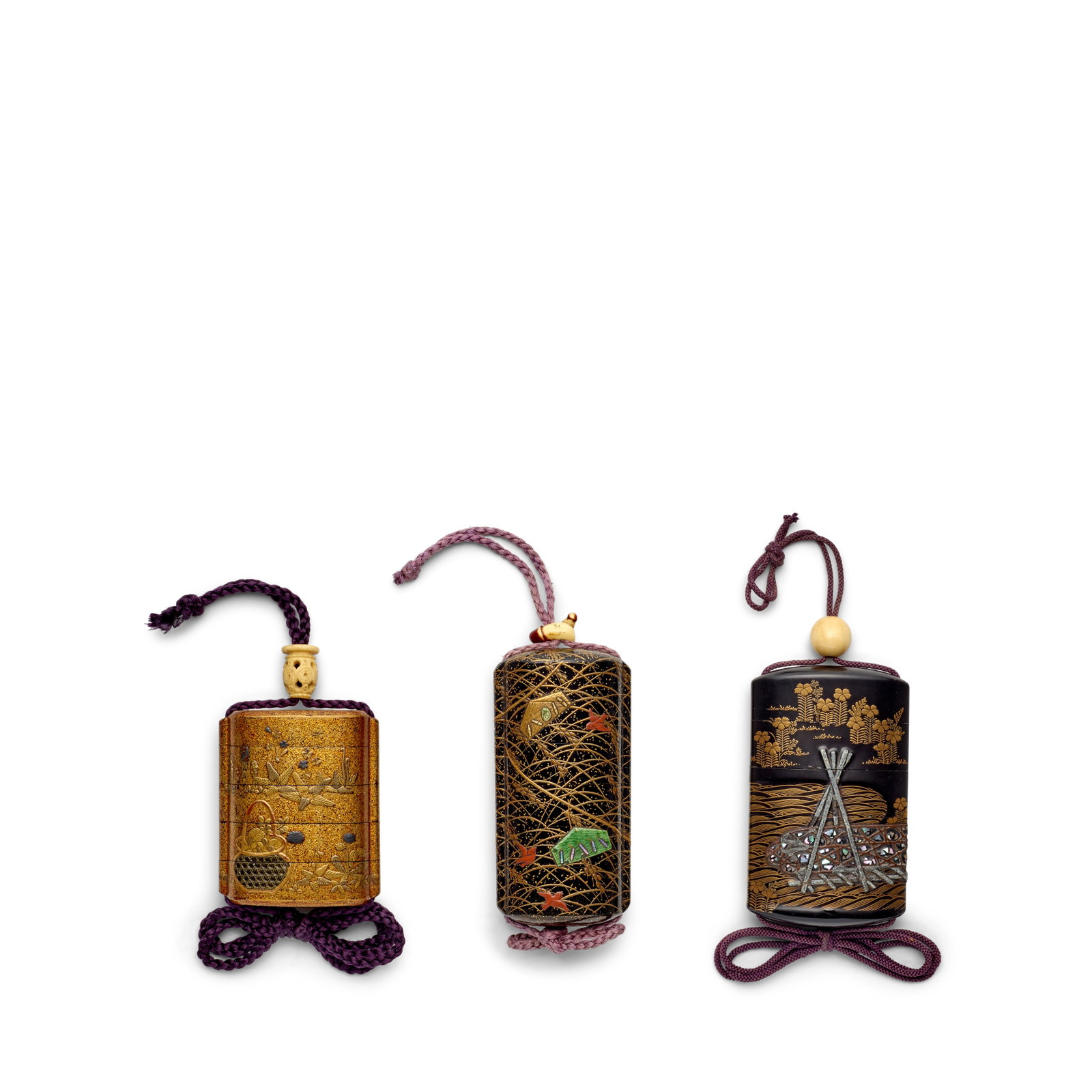 THREE INRŌ (MEDICINE CONTAINERS) WITH PLANT DESIGNS Edo period (1615-1868), 19th century (3): THREE INRŌ (MEDICINE CONTAINERS) WITH PLANT DESIGNS Edo period (1615-1868), 19th century The first of five cases, ovoid section with applied himotōshi, decorated in gold hiramaki-e, pottery,