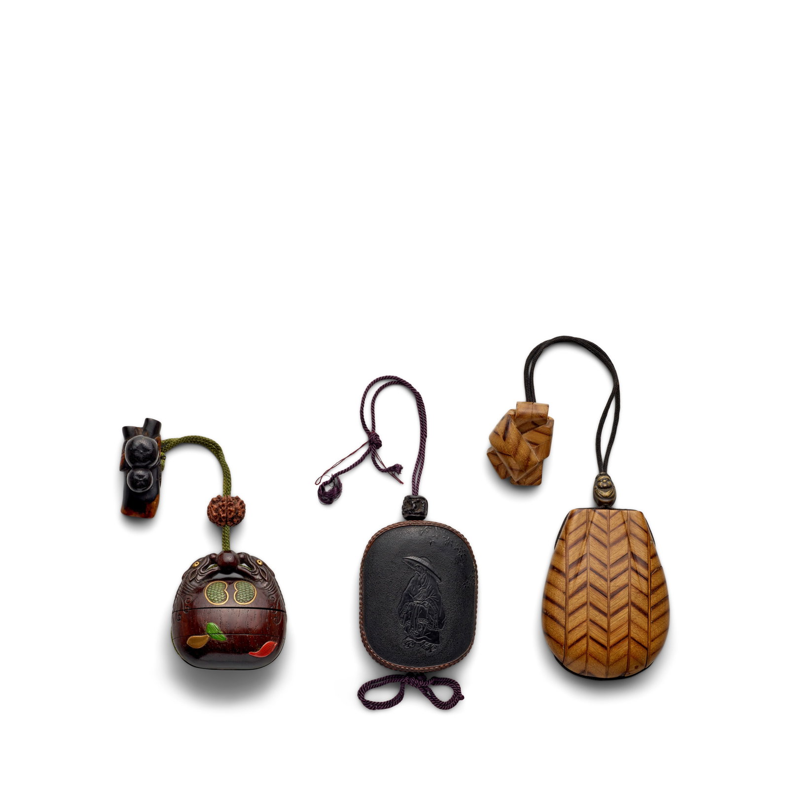 THREE SAGEMONO (SASH-CARRIED CONTAINERS) OF UNCONVENTIONAL FORM Edo period (1615-1868) or Meiji ... (1 of 1)