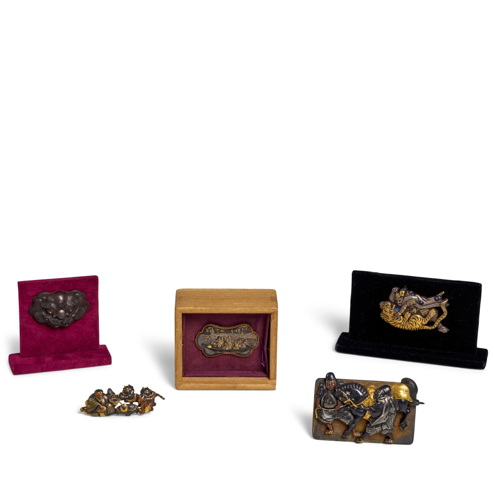 FIVE MIXED-METAL KANAMONO (POUCH CLASPS) Edo period (1615-1868) or Meiji era (1868-1912), 19th c...: FIVE MIXED-METAL KANAMONO (POUCH CLASPS) Edo period (1615-1868) or Meiji era (1868-1912), 19th century The first chiseled in the round and inlaid in gold, silver, copper shibuichi, and shakudō wi