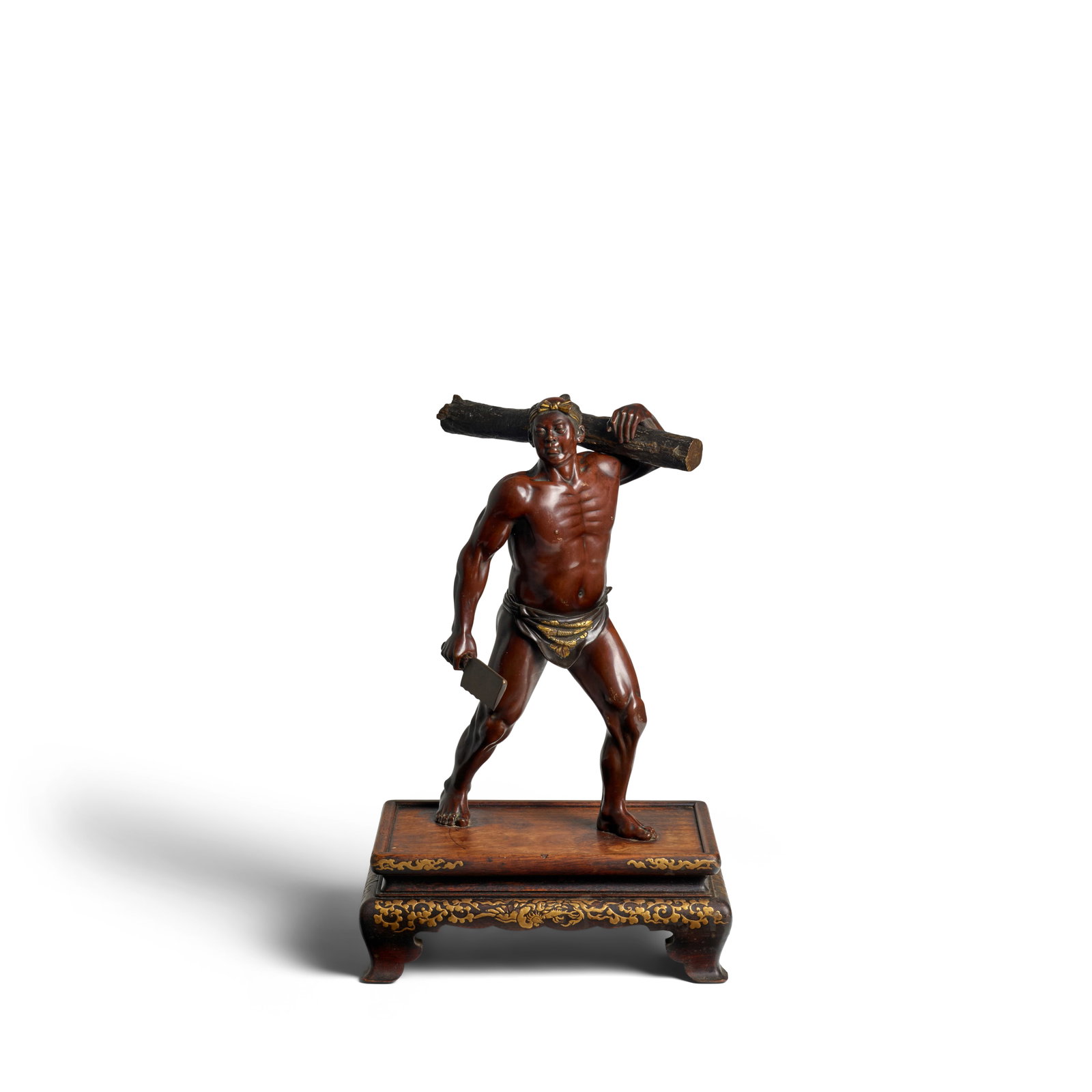 A PARCEL-GILT MIYAO-STYLE BRONZE MODEL OF A WOOD CUTTER Meiji era (1868-1912), late 19th century (1 of 1)