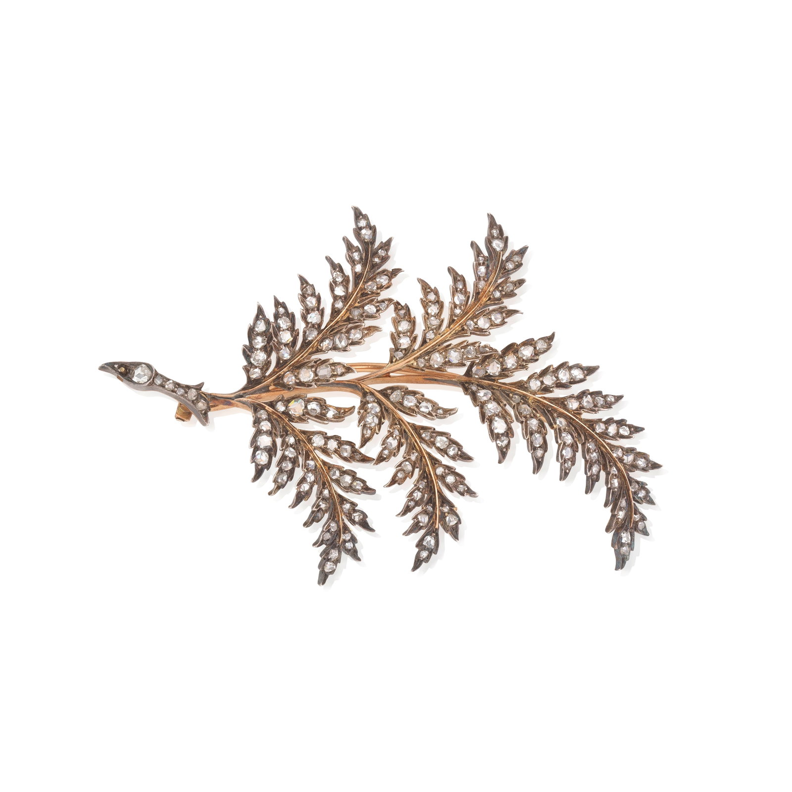 DIAMOND LEAF BROOCH, CIRCA 1890: DIAMOND LEAF BROOCH, CIRCA 1890 Realistically modelled as a fern, set throughout with rose-cut diamonds, mounted in silver and gold, French assay marks, numbered, brooch fitting detachable, one