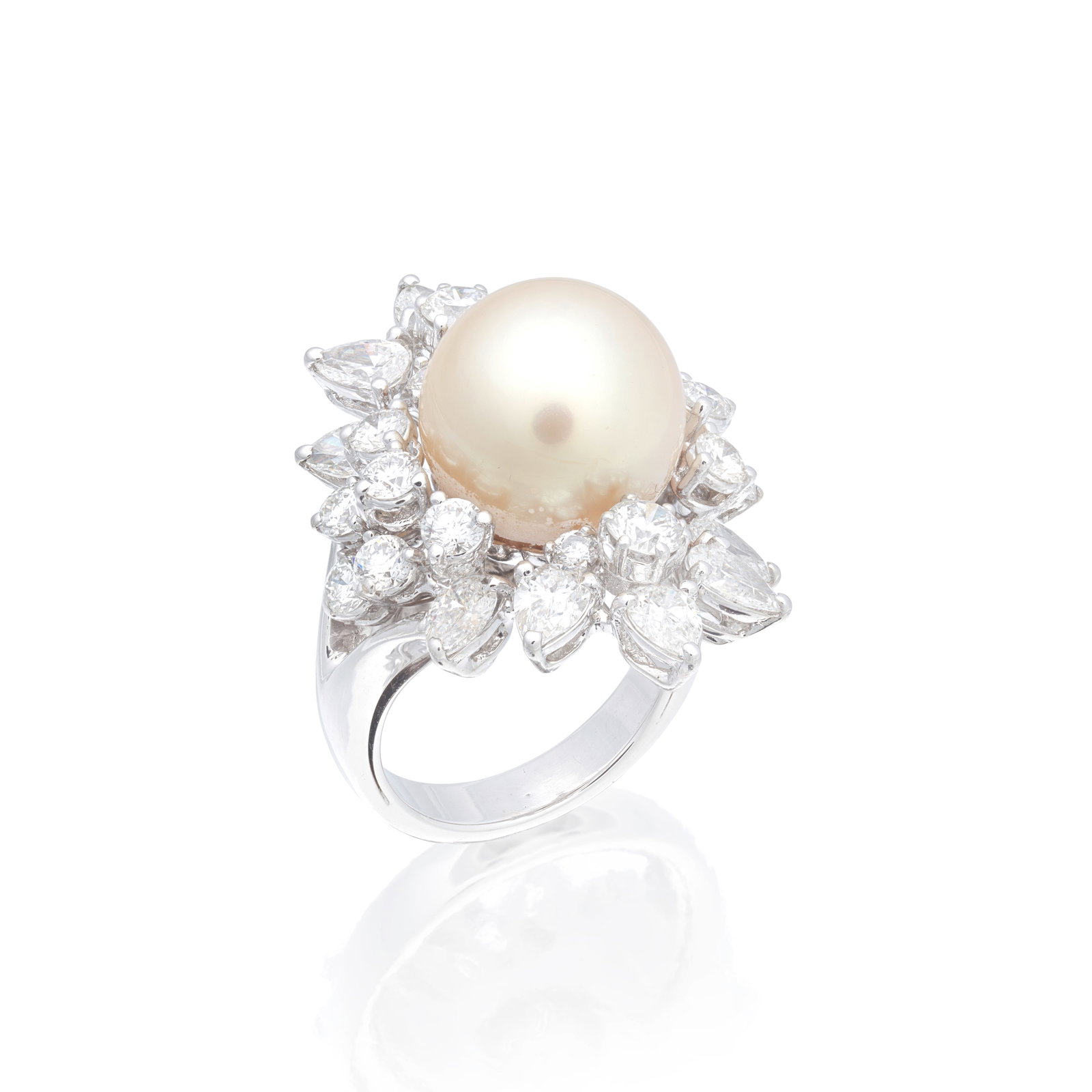 CULTURED PEARL AND DIAMOND CLUSTER RING: CULTURED PEARL AND DIAMOND CLUSTER RING The 12.1mm cultured pearl of golden tint within a radiating surround of brilliant and pear-cut diamonds, diamonds approx. 3.35cts total, ring size approx. H