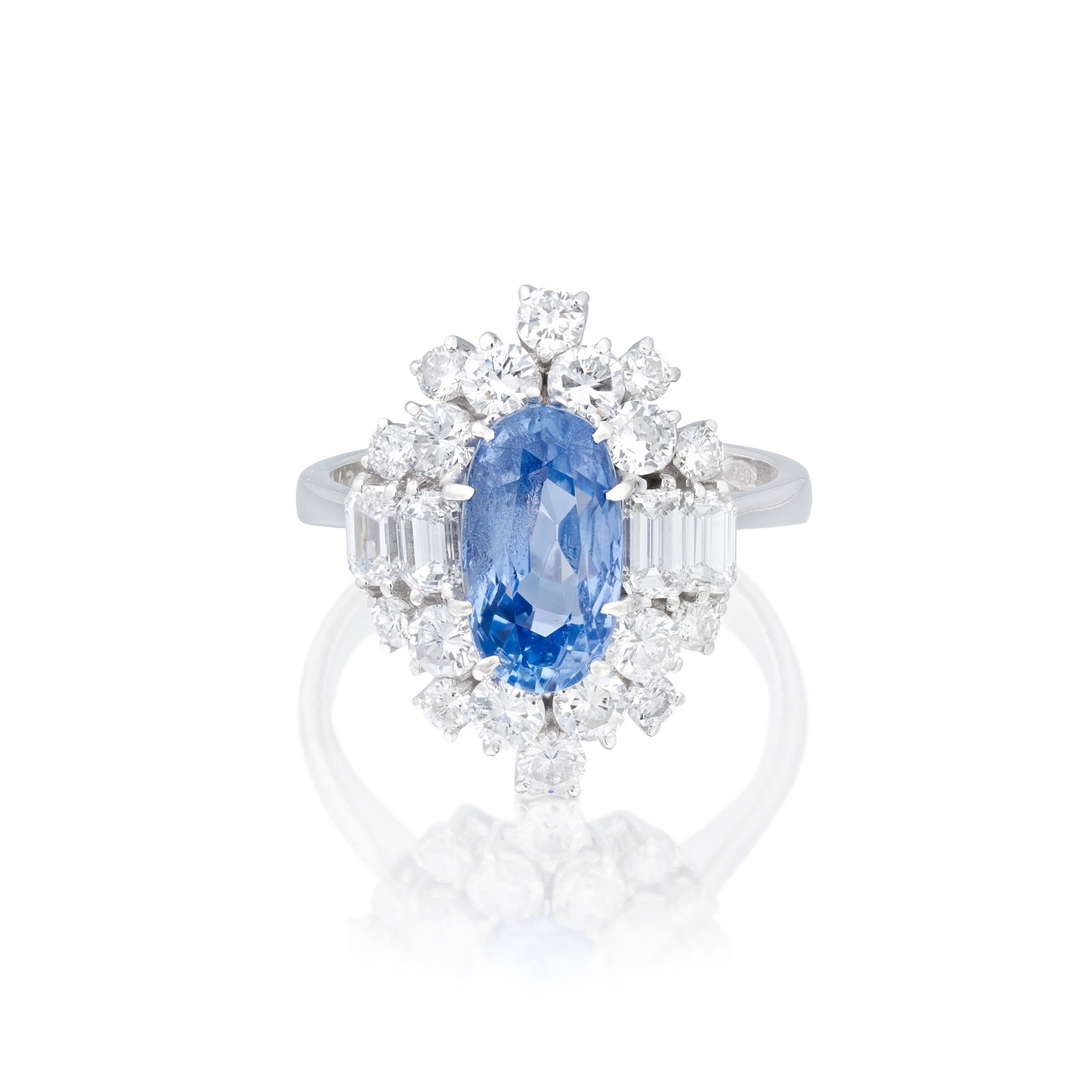 SAPPHIRE AND DIAMOND CLUSTER RING: SAPPHIRE AND DIAMOND CLUSTER RING The oval-cut sapphire weighing 3.43 carats, within a brilliant and baguette-cut diamond surround, diamonds approx. 1.20cts total, ring size approx. O½