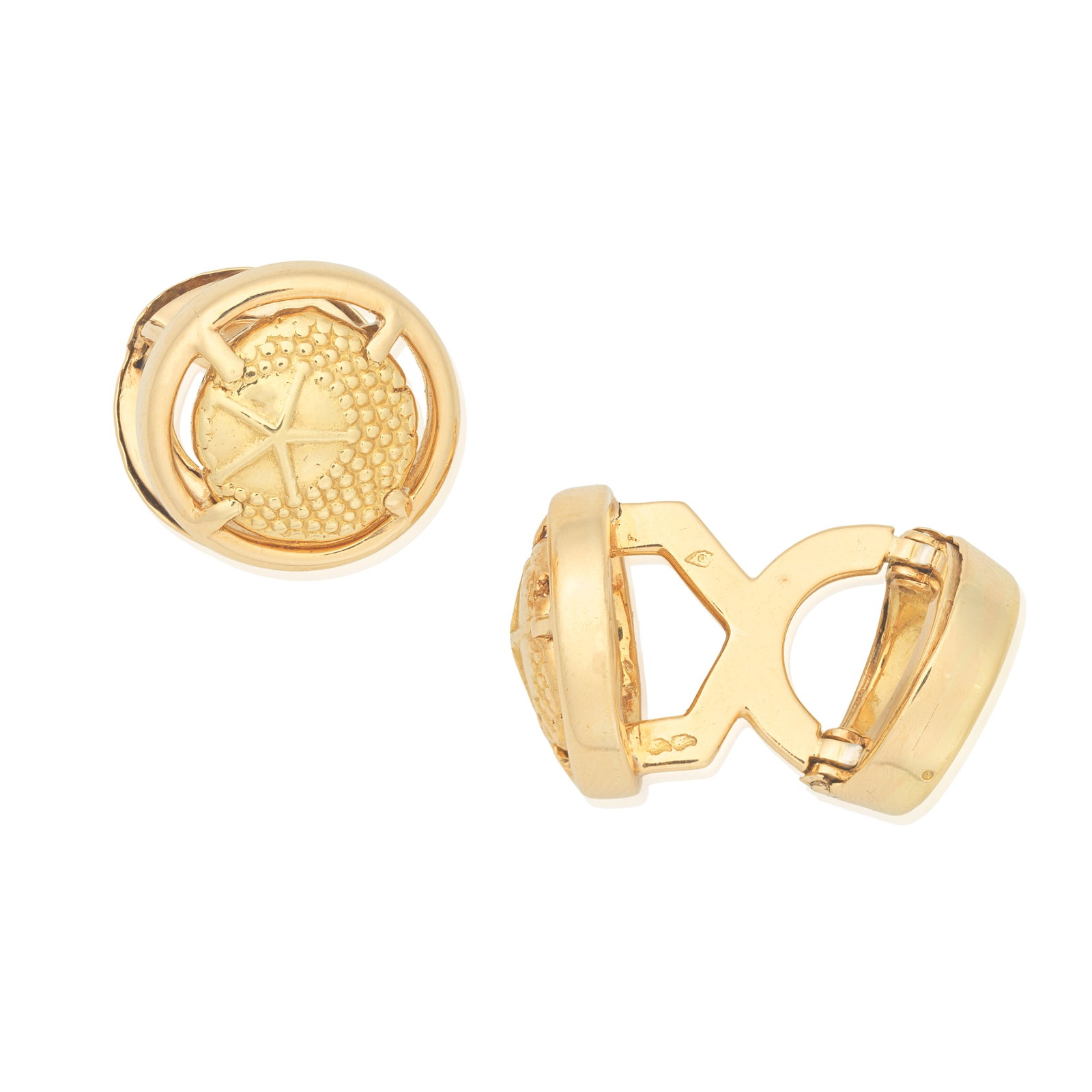 CARTIER: CUFFLINKS: CARTIER: CUFFLINKS The circular faces depicting a starfish to a textured ground, signed Cartier Paris, maker's marks, French assay marks, face length 1.3cm For further information on this lot please