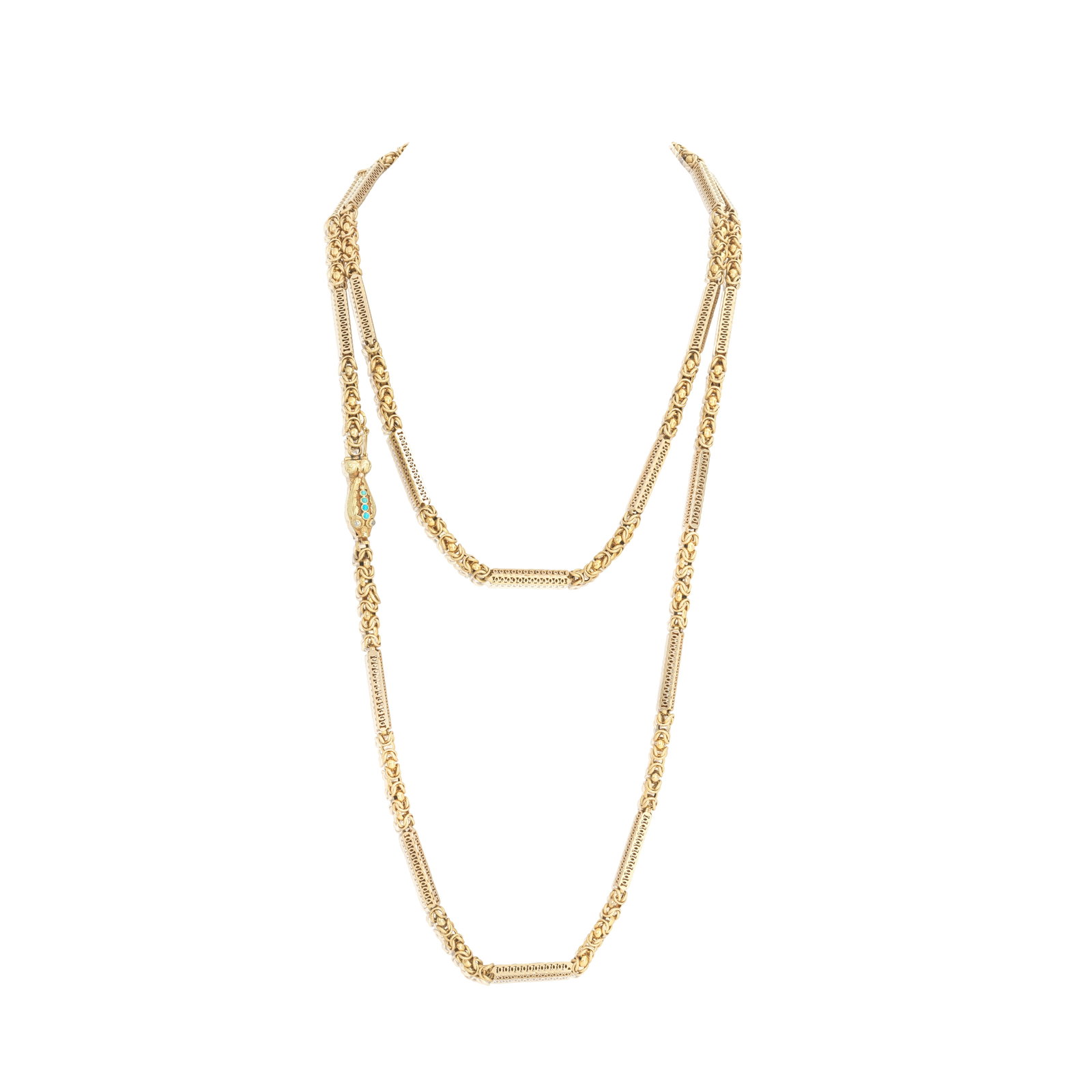 GOLD LONGCHAIN, 19TH CENTURY: GOLD LONGCHAIN, 19TH CENTURY The scroll pierced batons joined by highly polished and textured fancy-linking, to a stylised fish clasp set with turquoise cabochons with rose-cut diamond eyes, length