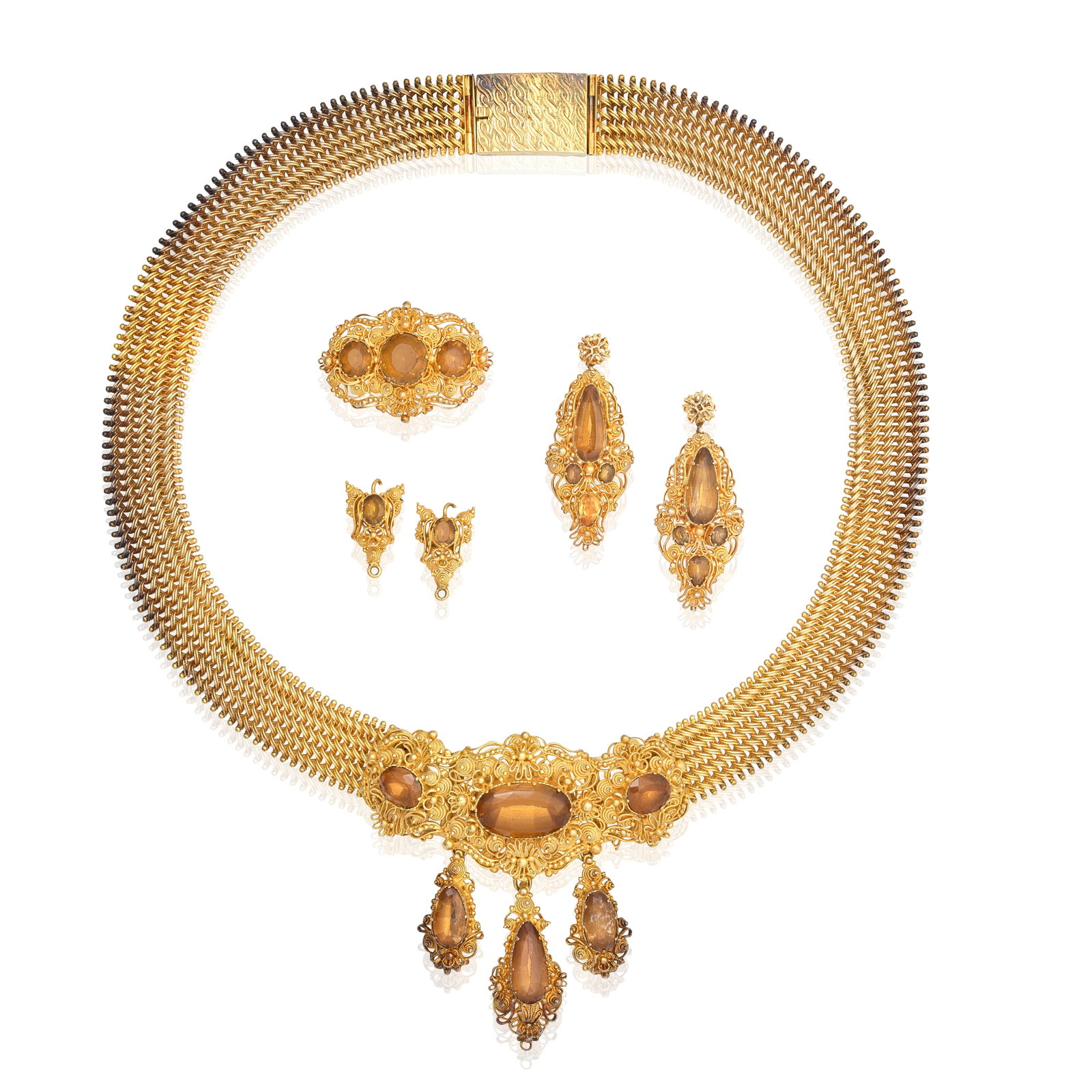 GOLD CANNETILLE AND TOPAZ DEMI-PARURE, CIRCA 1830 AND LATER (5): GOLD CANNETILLE AND TOPAZ DEMI-PARURE, CIRCA 1830 AND LATER The necklace of flexible linking, issuing a cannetille frontispiece set with oval-cut topaz and three detachable pear-cut topaz drops,