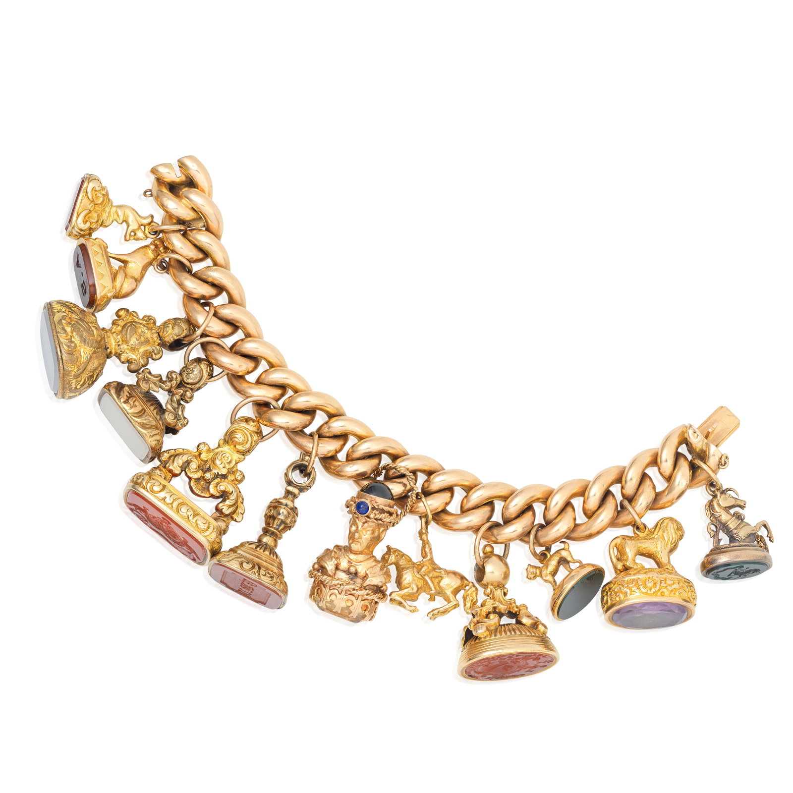 CHARM BRACELET: CHARM BRACELET The bracelet of bombé curb linking suspending eleven fob seals and one horse and rider charm, length 18.5cm Footnotes: A Selection of Jewels from a Private Single Owner Collection