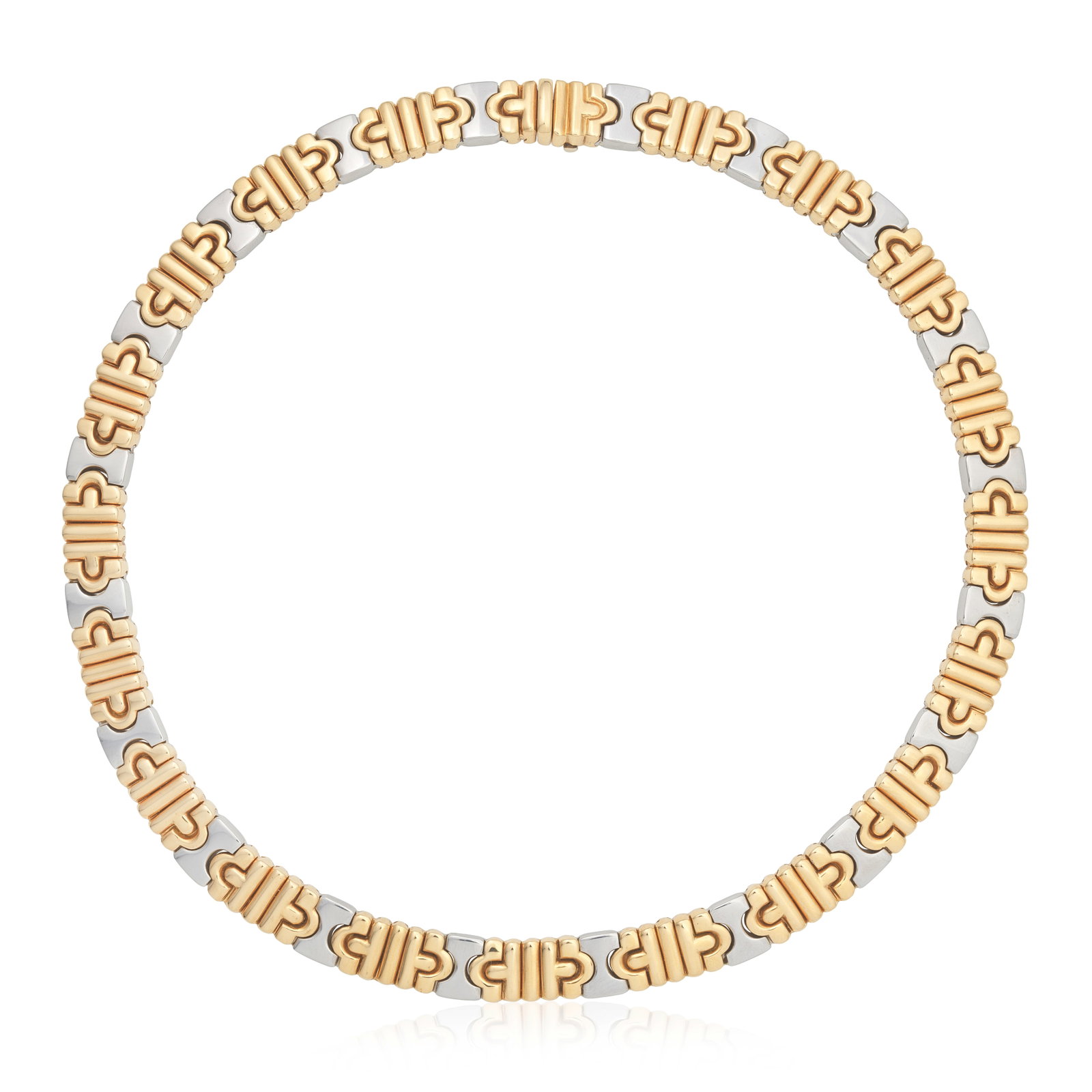 BULGARI: 'PARENTESI' NECKLACE: BULGARI: 'PARENTESI' NECKLACE The highly articulated necklace of bicoloured geometric design, signed Bulgari, length 40.6cm, maker's pouch For further information on this lot please visit Bonhams.com