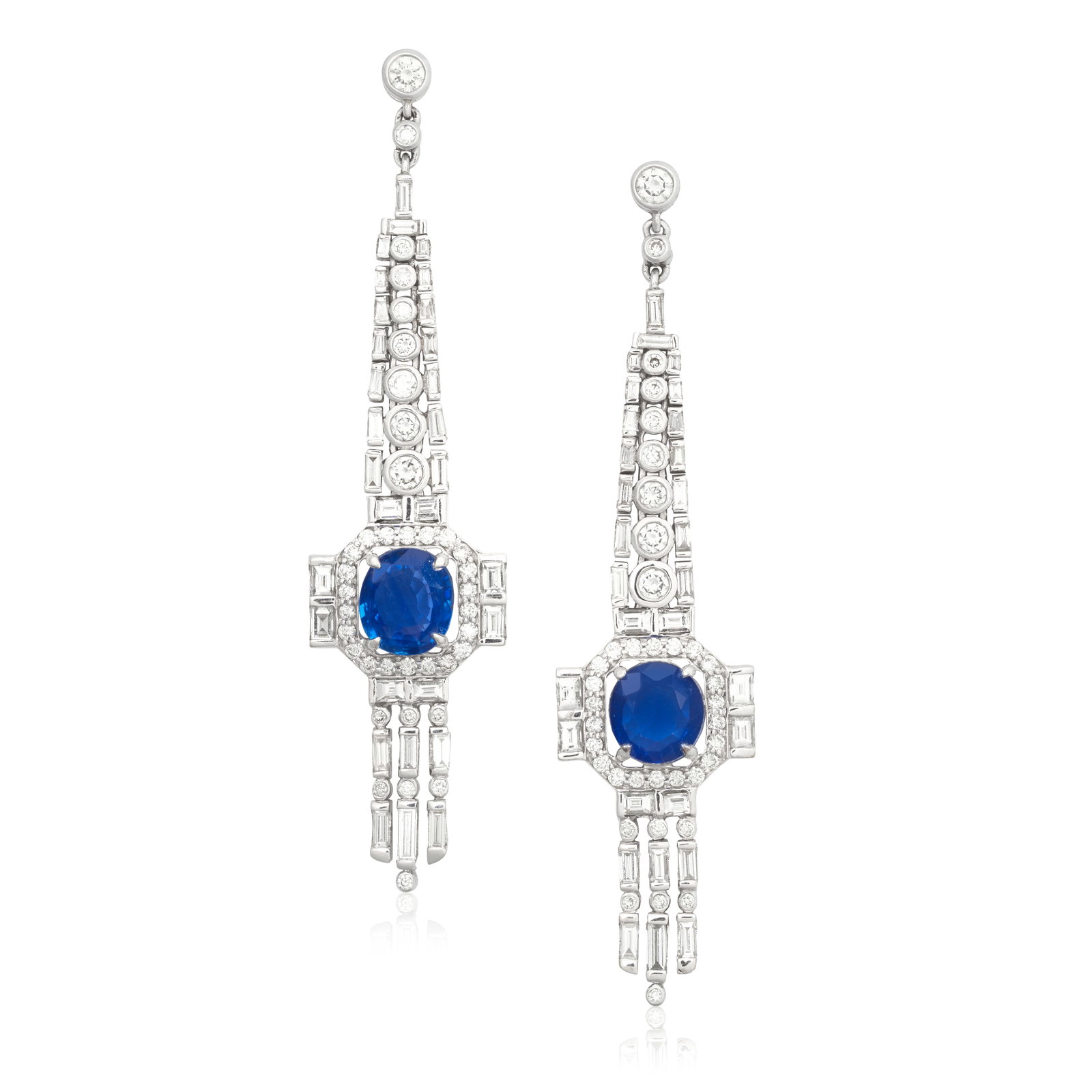 SAPPHIRE AND DIAMOND PENDENT EARRINGS: SAPPHIRE AND DIAMOND PENDENT EARRINGS Of articulated design, set throughout with brilliant and baguette-cut diamonds, each centred by a circular-cut sapphire, diamonds approx. 4.25cts total, length