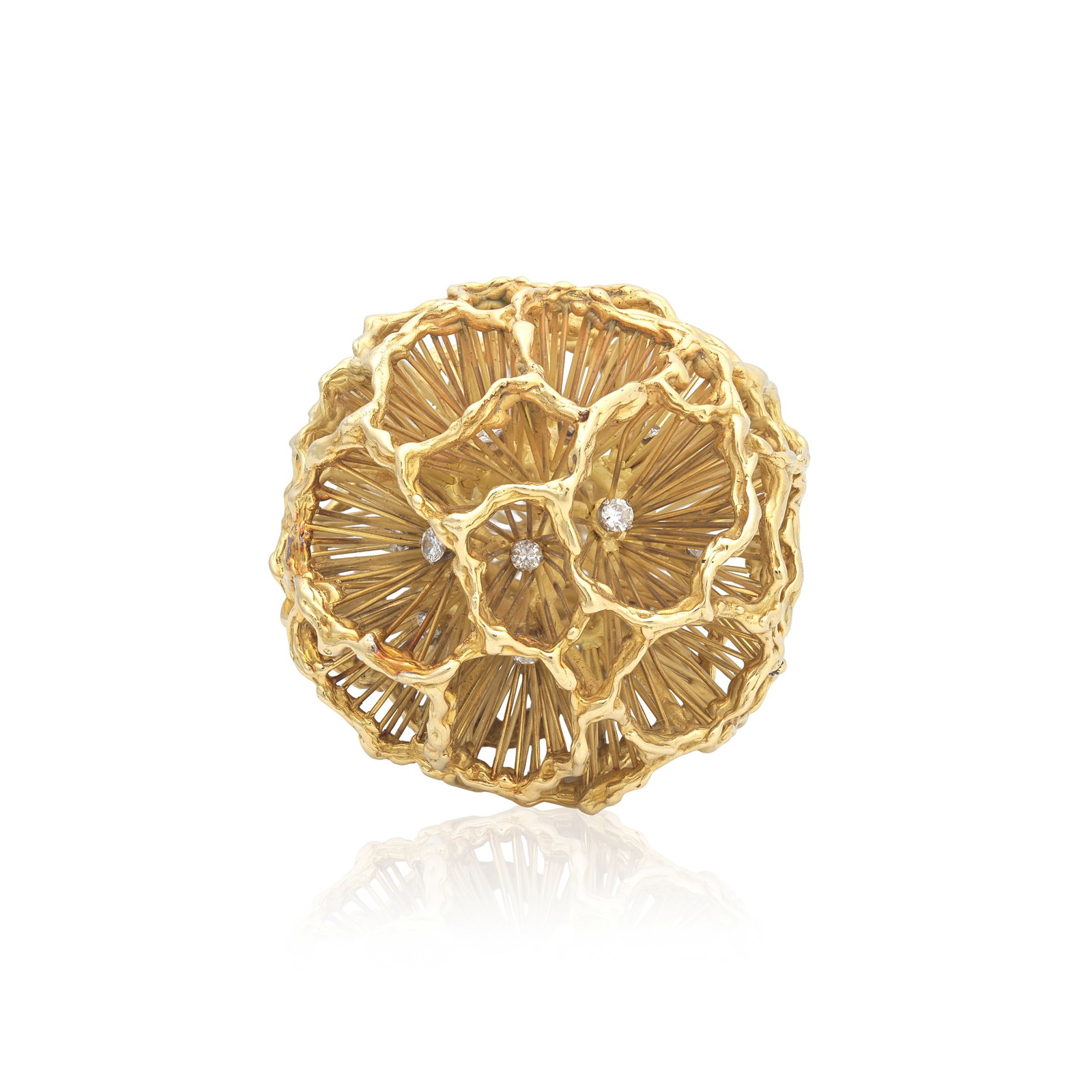 DIAMOND-SET JEWEL, CIRCA 1970: DIAMOND-SET JEWEL, CIRCA 1970 Of spherical form, designed as an abstract flowerhead, with openwork petals, accented with brilliant-cut diamonds, diamonds very approx. 1.65cts total, length 4.4cm For
