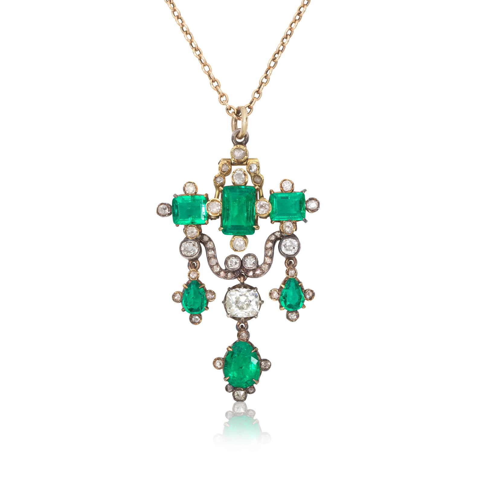 EMERALD AND DIAMOND PENDANT/NECKLACE: EMERALD AND DIAMOND PENDANT/NECKLACE Three step-cut emeralds suspending a swag motif of rose-cut diamonds, terminating in a triple drop of pear-cut emeralds and an old cushion-cut diamond, all set to 