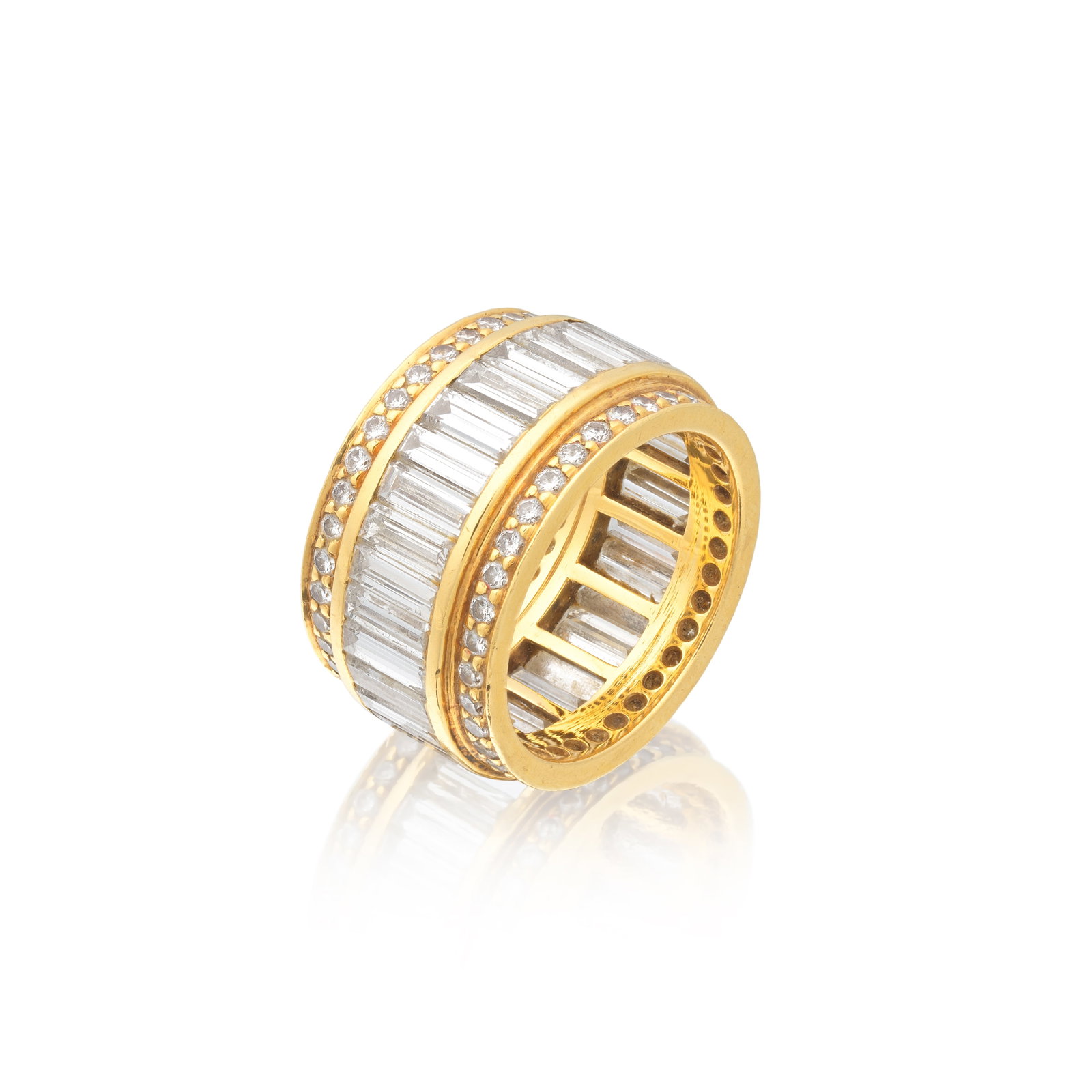IVOR GORDON: DIAMOND RING: IVOR GORDON: DIAMOND RING Set throughout with baguette and brilliant-cut diamonds, maker's mark, diamonds approx. 7.00cts total, one diamond deficient, ring size very approx. L (leading edge),