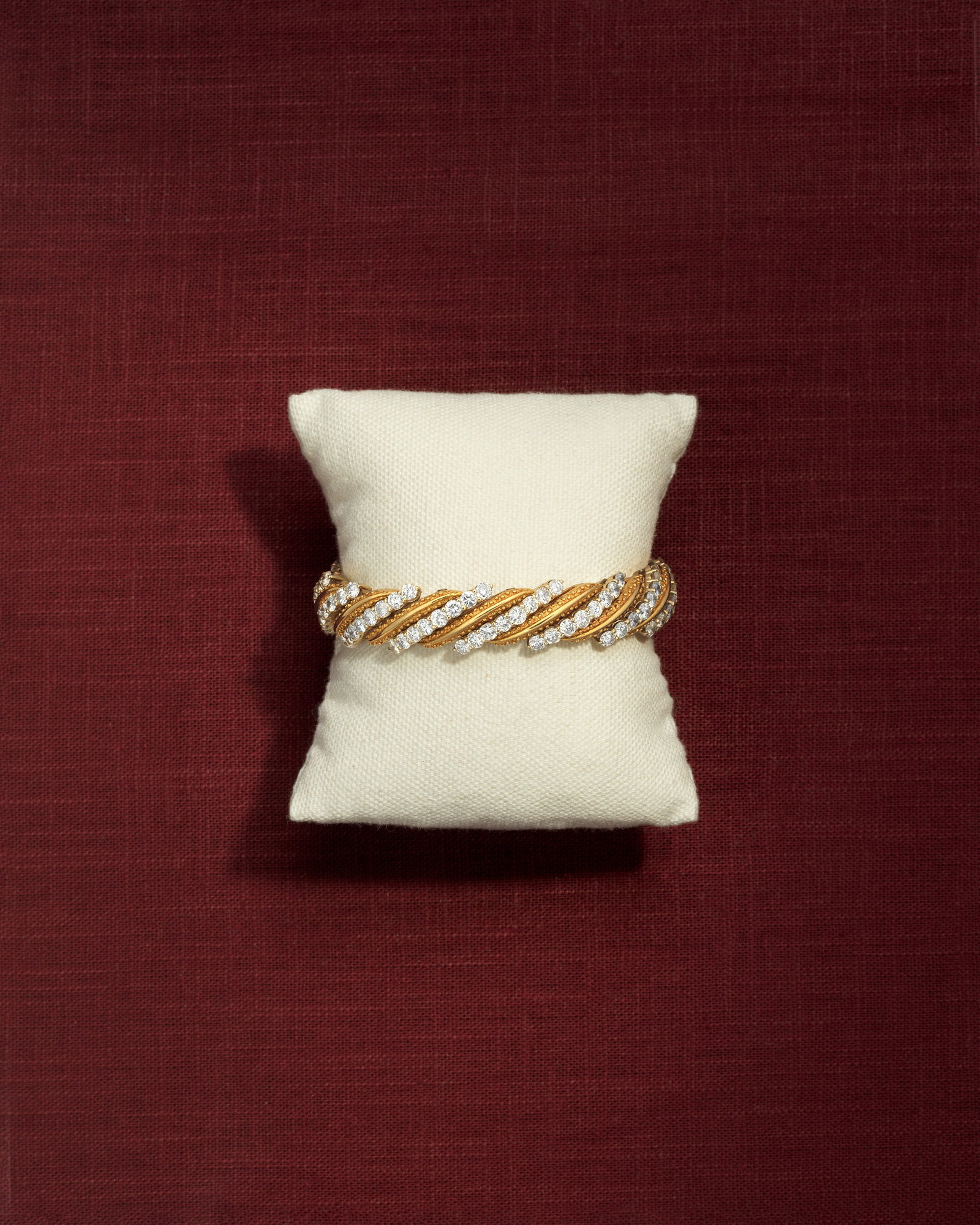 HAMMERMAN BROTHERS: DIAMOND-SET BRACELET, MID-20TH CENTURY: HAMMERMAN BROTHERS: DIAMOND-SET BRACELET, MID-20TH CENTURY The alternating rows of brilliant-cut diamonds and textured links, maker's mark, diamonds approx. 13.00cts total, length 18.5cm Footnotes: