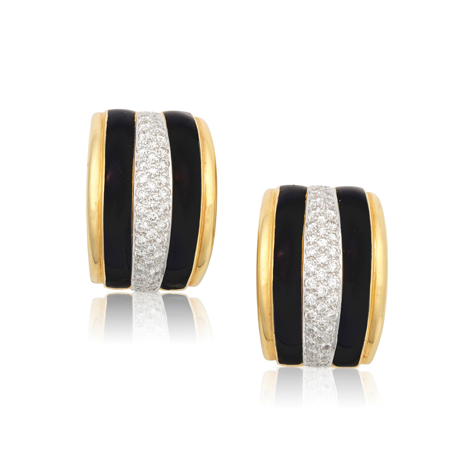 ANDREW CLUNN: DIAMOND AND ENAMEL EARCLIPS, CIRCA 1987: ANDREW CLUNN: DIAMOND AND ENAMEL EARCLIPS, CIRCA 1987 Pavé-set with brilliant-cut diamonds, accented by black enamel, signed A.Clunn, diamonds approx. 1.50cts total, length 2.7cm Footnotes: