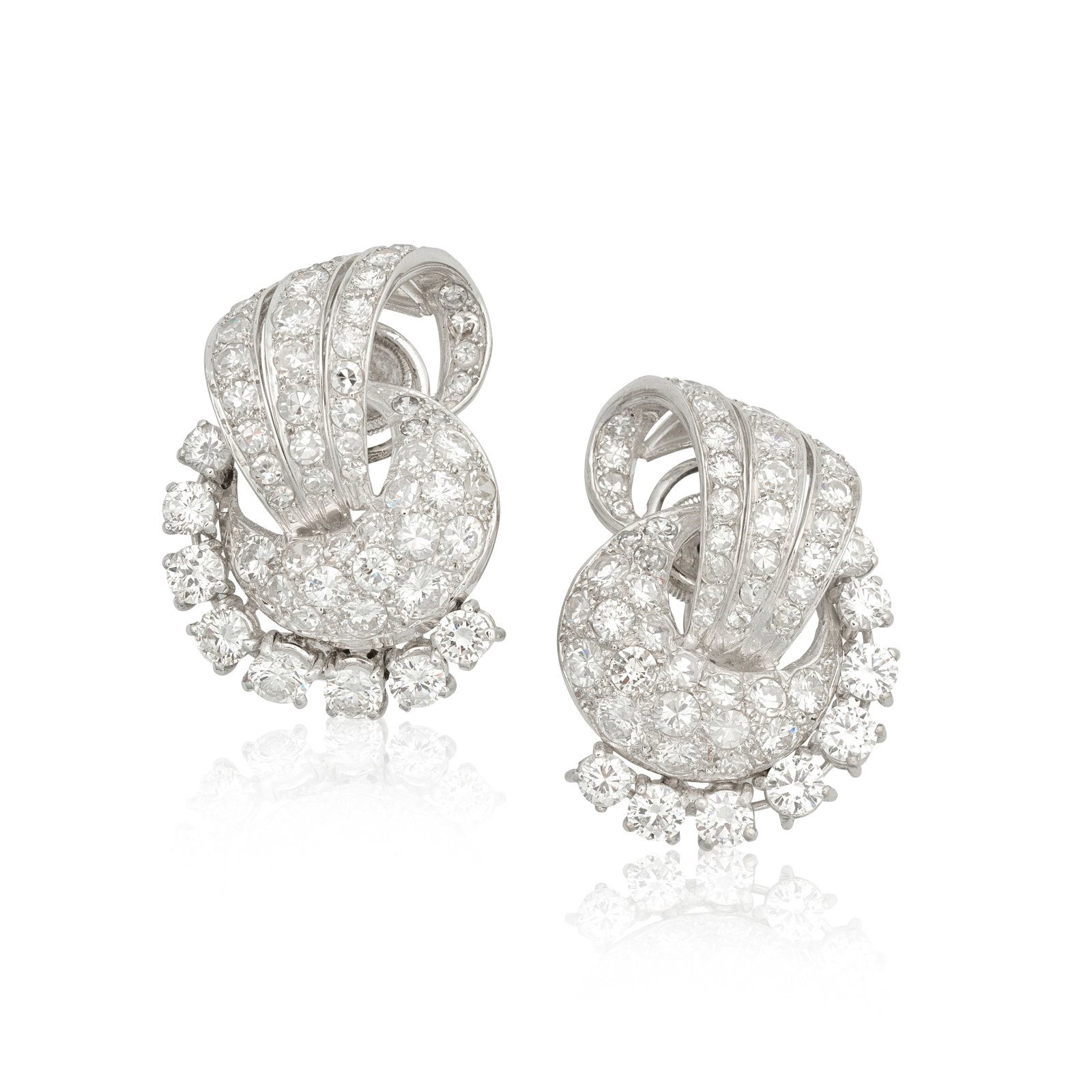 DIAMOND EARRINGS, CIRCA 1950: DIAMOND EARRINGS, CIRCA 1950 Of scroll design, set throughout with brilliant and single-cut diamonds, diamonds approx. 6.30cts total, length 2.6cm For further information on this lot please visit