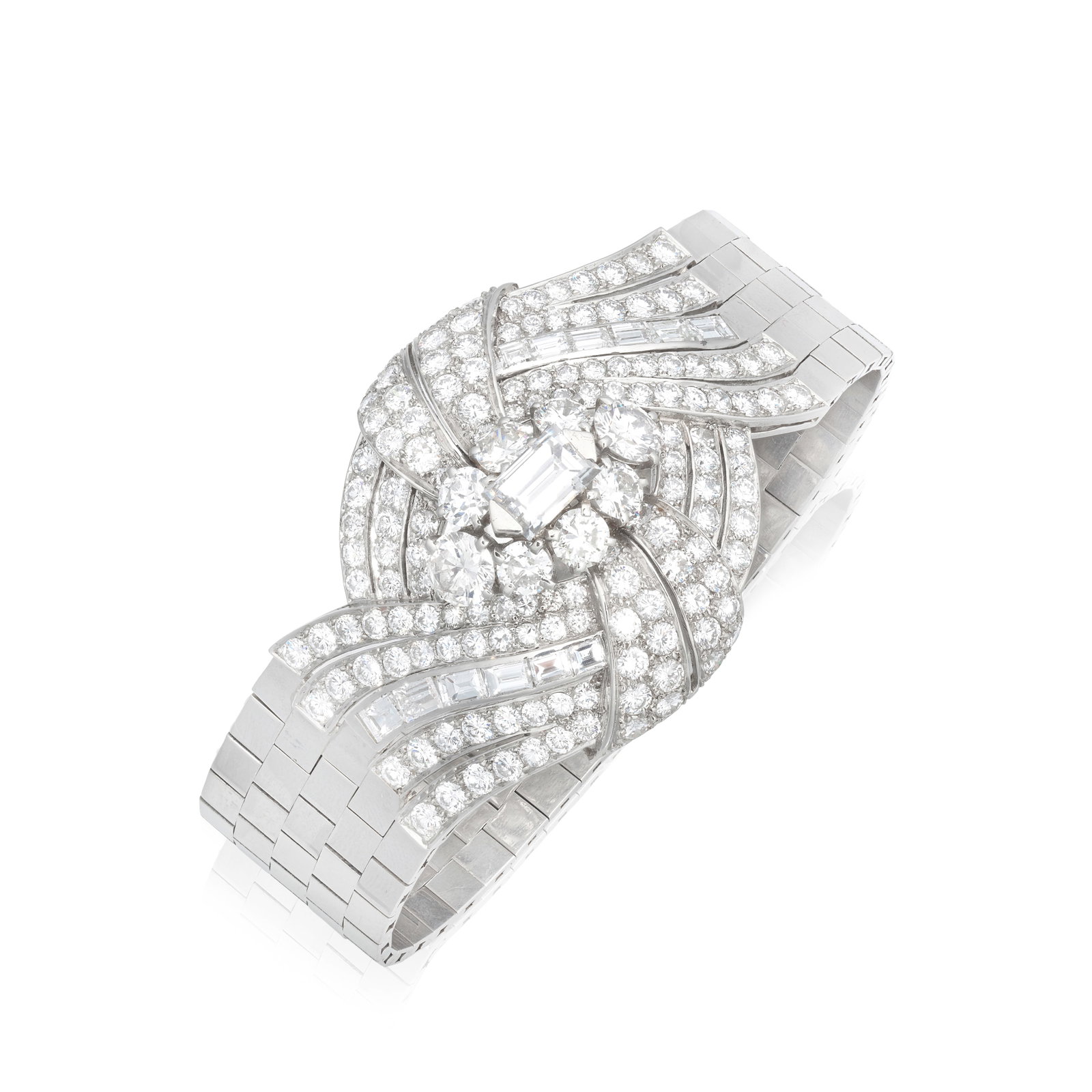 DIAMOND STRAP BRACELET, CIRCA 1940: DIAMOND STRAP BRACELET, CIRCA 1940 Set to the front with a step-cut diamond, within a scrolled surround of brilliant and step-cut diamonds, to a flexible brick-link bracelet, French assay marks,