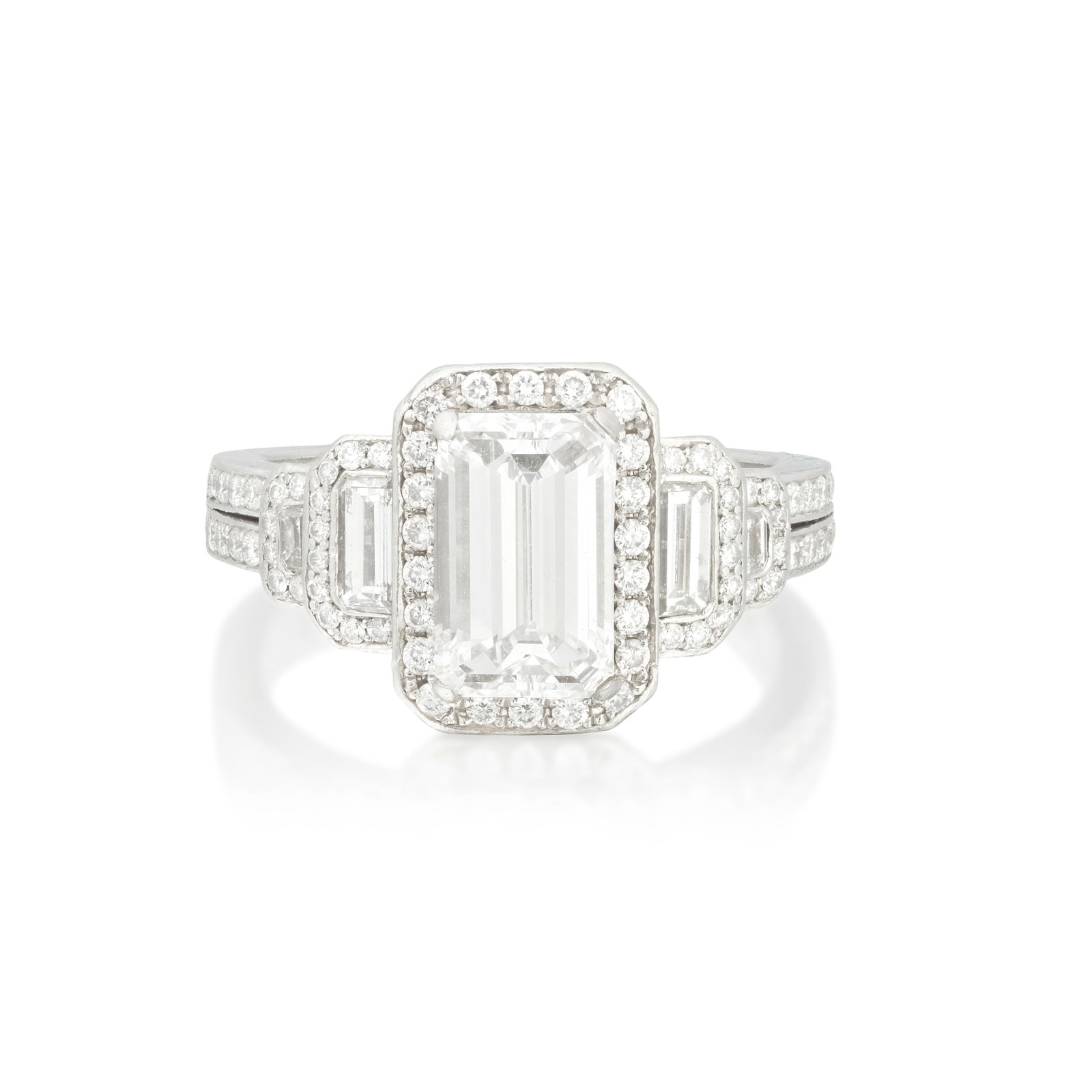 DIAMOND RING: DIAMOND RING The central step-cut diamond weighing 1.50 carats, between step, epaulette-cut and brilliant-cut diamonds, ring size approx. K For further information on this lot please visit Bonhams.com