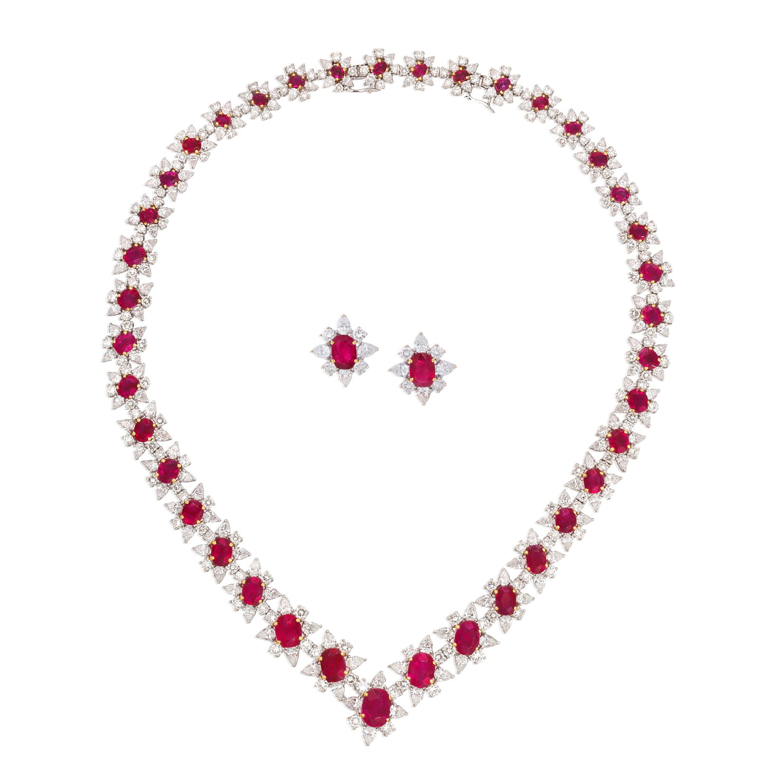 JACENTE: RUBY AND DIAMOND NECKLACE AND EARRING SUITE (2): JACENTE: RUBY AND DIAMOND NECKLACE AND EARRING SUITE Composed of a series of cushion-shaped rubies, brilliant and pear-shaped diamond clusters graduating in size towards the centre, signed Jacente,