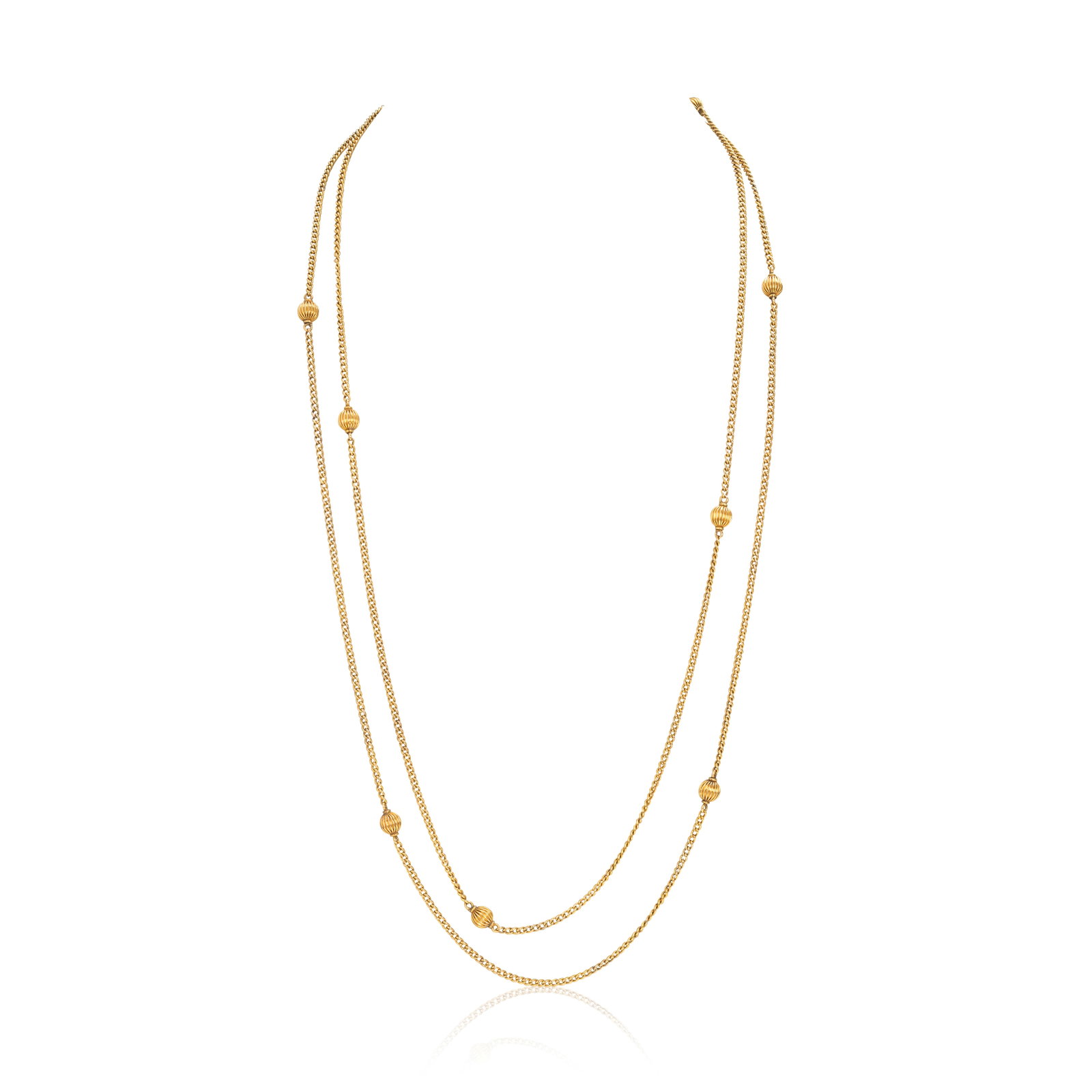 LONGCHAIN, CIRCA 1900: LONGCHAIN, CIRCA 1900 The golf chain composed of fluted beads to a curb-link chain, length 145.8cm For further information on this lot please visit Bonhams.com