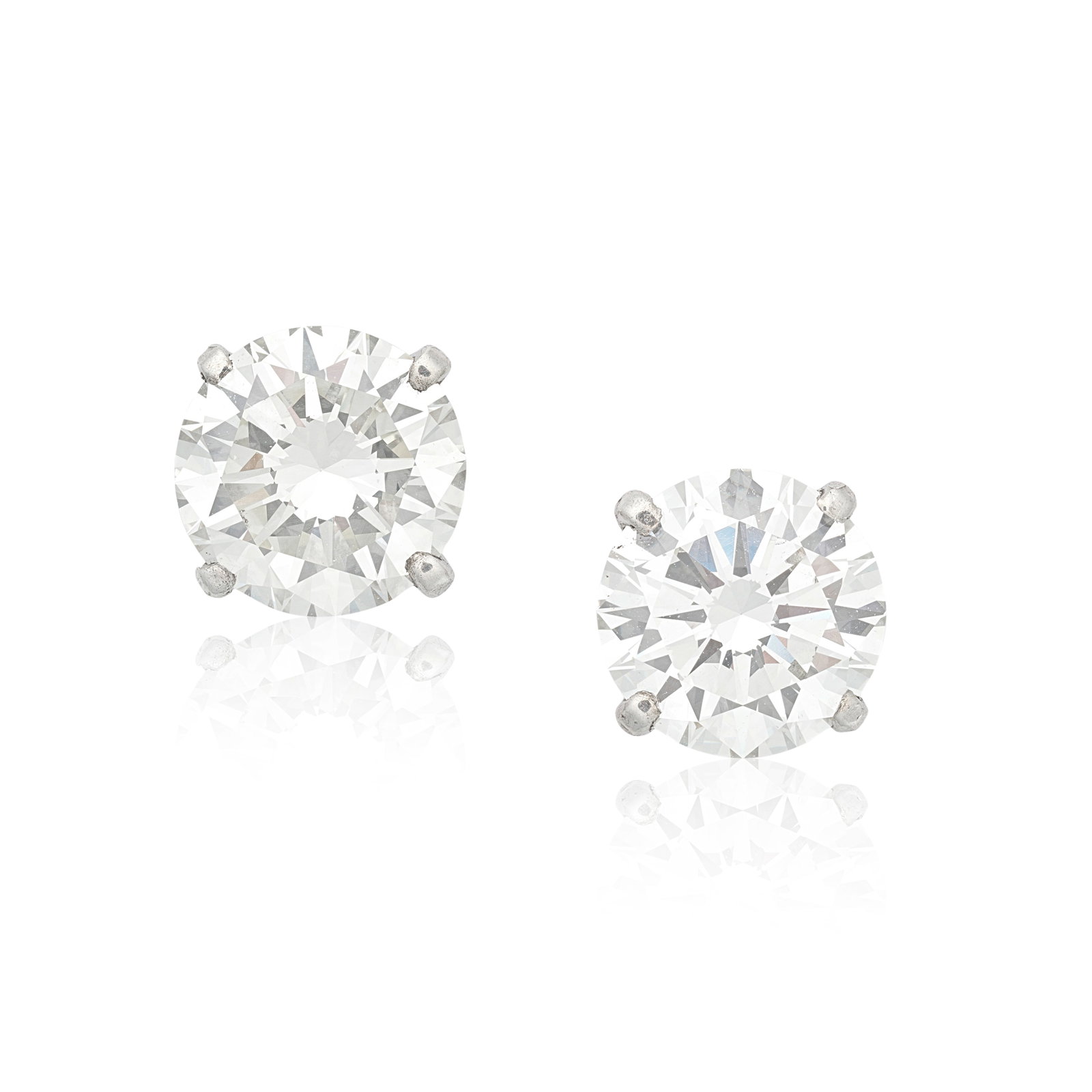 DIAMOND SINGLE-STONE EARSTUDS: DIAMOND SINGLE-STONE EARSTUDS The brilliant-cut diamonds weighing 2.25 carats and 2.09 carats For further information on this lot please visit Bonhams.com