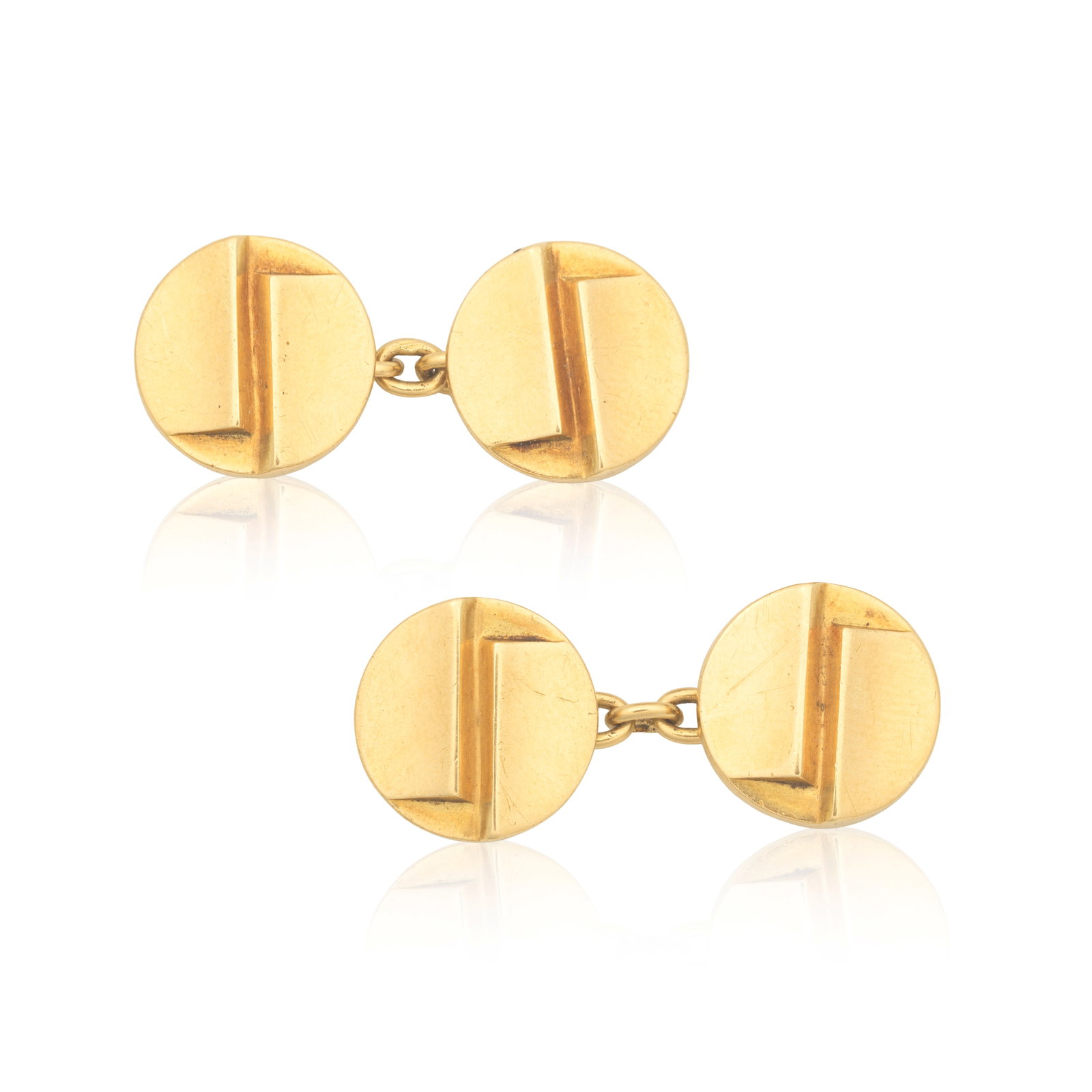 RENÉ BOIVIN: CUFFLINKS, CIRCA 1935: RENÉ BOIVIN: CUFFLINKS, CIRCA 1935 Double-sided: each circular plaque of geometric recessed form, unsigned, French assay marks, plaque diameter 1.4cm Footnotes: Accompanied by a certificate from