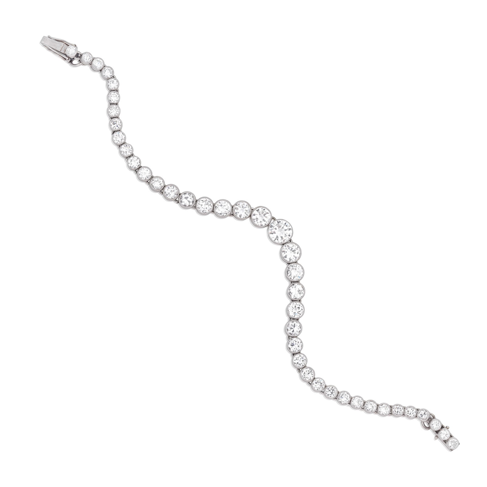 DIAMOND LINE BRACELET: DIAMOND LINE BRACELET The brilliant-cut diamonds graduating in size towards the centre, diamonds approx. 7.65cts total, length 16.5cm For further information on this lot please visit Bonhams.com