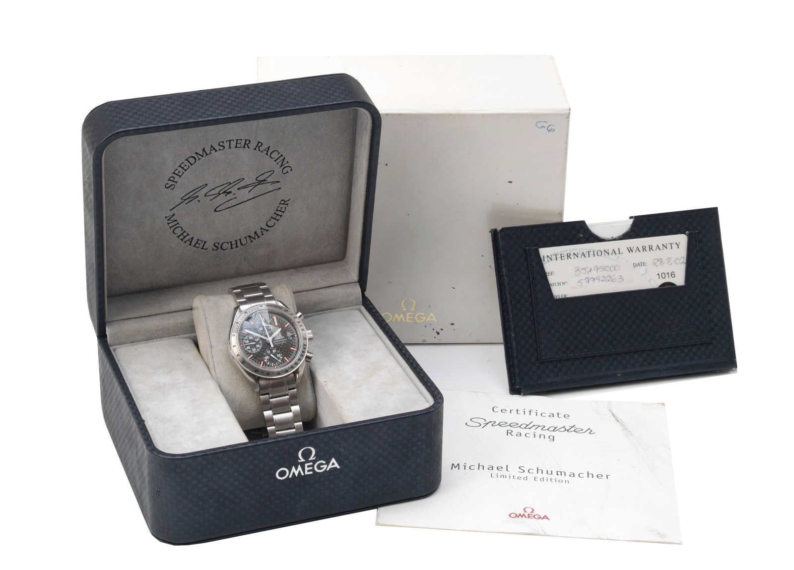 A cased Omega Speedmaster Racing 'Michael Schumacher World Champion 2001' limited edition automa...: A cased Omega Speedmaster Racing 'Michael Schumacher World Champion 2001' limited edition automatic wristwatch, (Ref:3519.50.00), stainless steel case, 39mm, fixed bezel, with black carbon-fibre effec