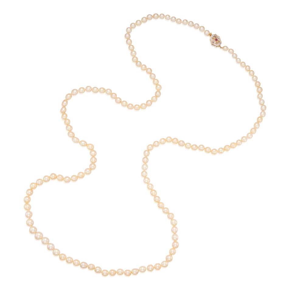 BICOLORED GOLD, CULTURED PEARL, RUBY, AND DIAMOND NECKLACE: BICOLORED GOLD, CULTURED PEARL, RUBY, AND DIAMOND NECKLACE • 14K white and yellow gold • Numerous cultured pearls measuring approximately 7.50mm to 8.12mm in diameter • An oval
