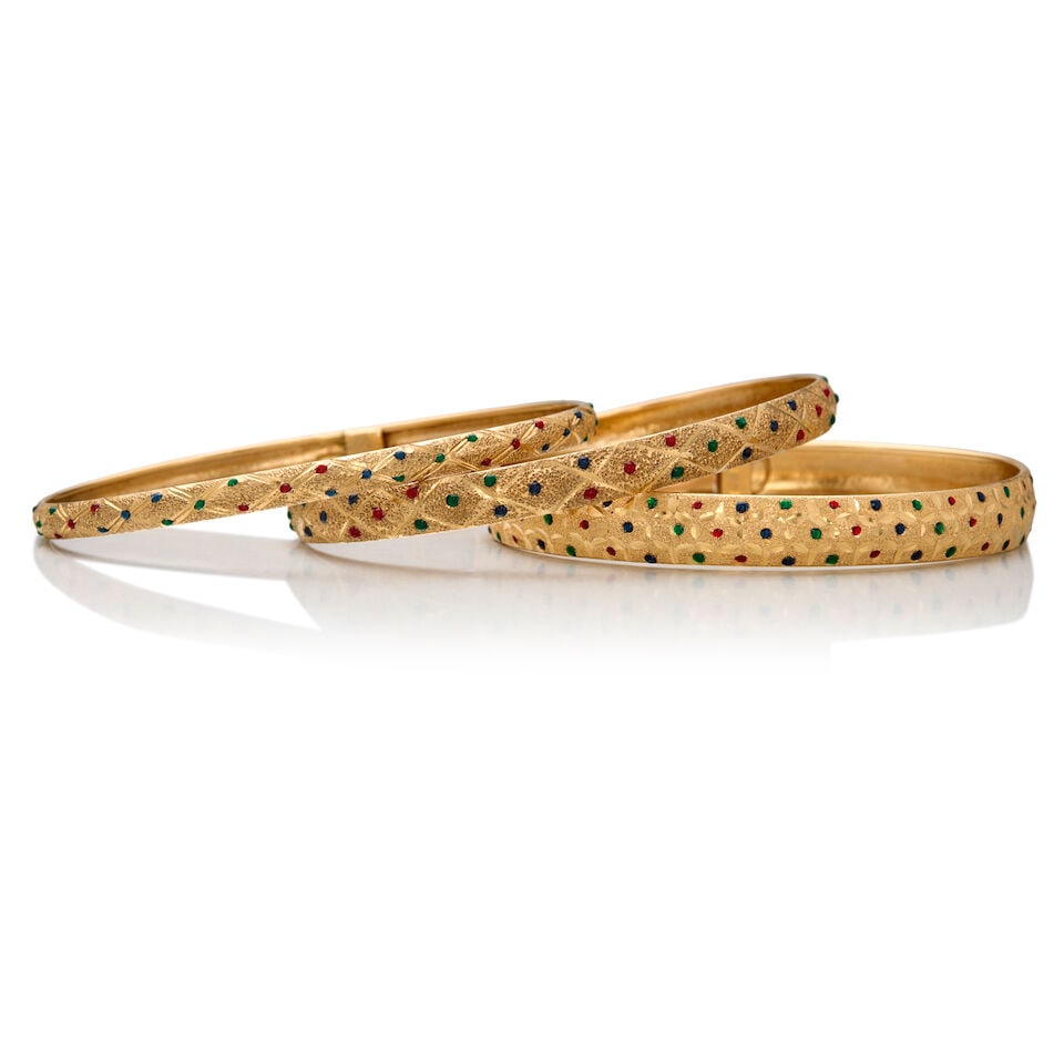 THREE GOLD AND GLASS BANGLES - 3
